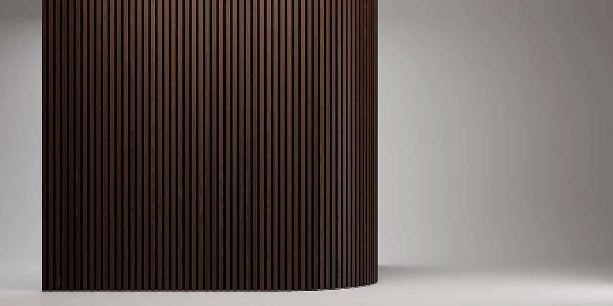 Close-up of a curved wooden panel with vertical slats, against a plain white background.