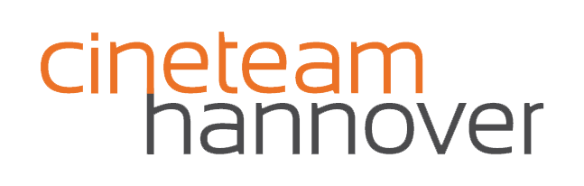 Logo of the film production company Cineteam Hannover logo with orange and gray text on a white background.
