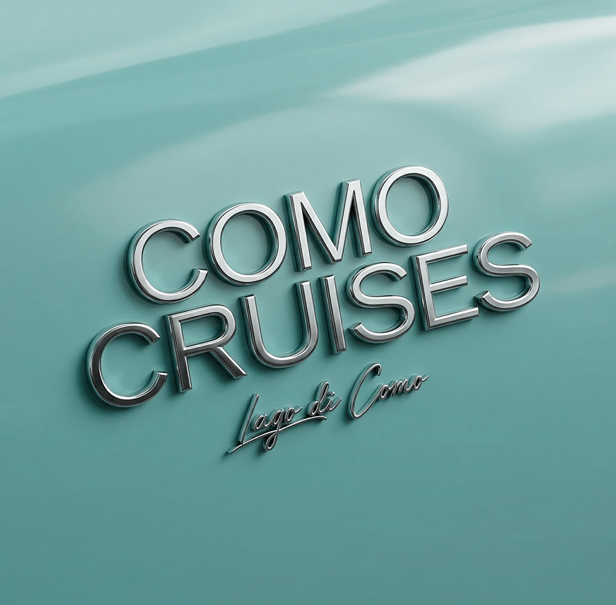 Sign reading 'Como Cruises Lago di Como' against a light turquoise background.