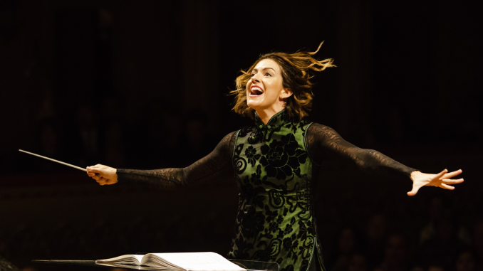 woman conducting choir