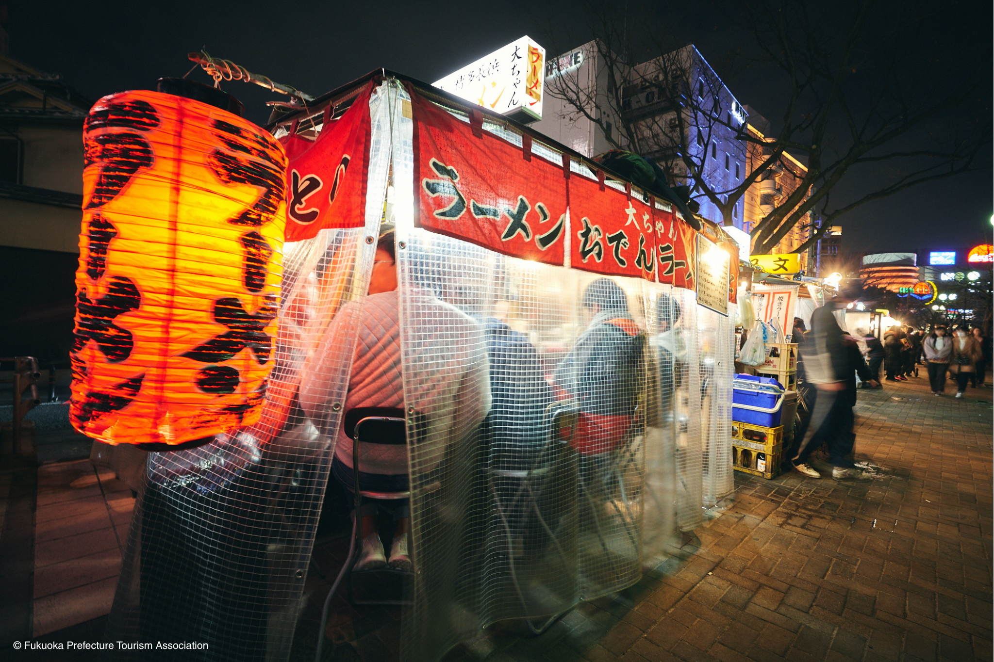 Ramen restaurant street at night with red lanterns, Fukuoka Japan