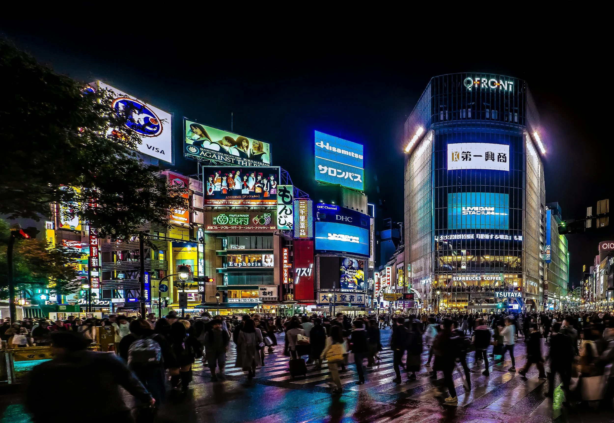 Shibuya scramble crossing Tokyo at night — common Japan travel mistakes to avoid for Australian travellers
