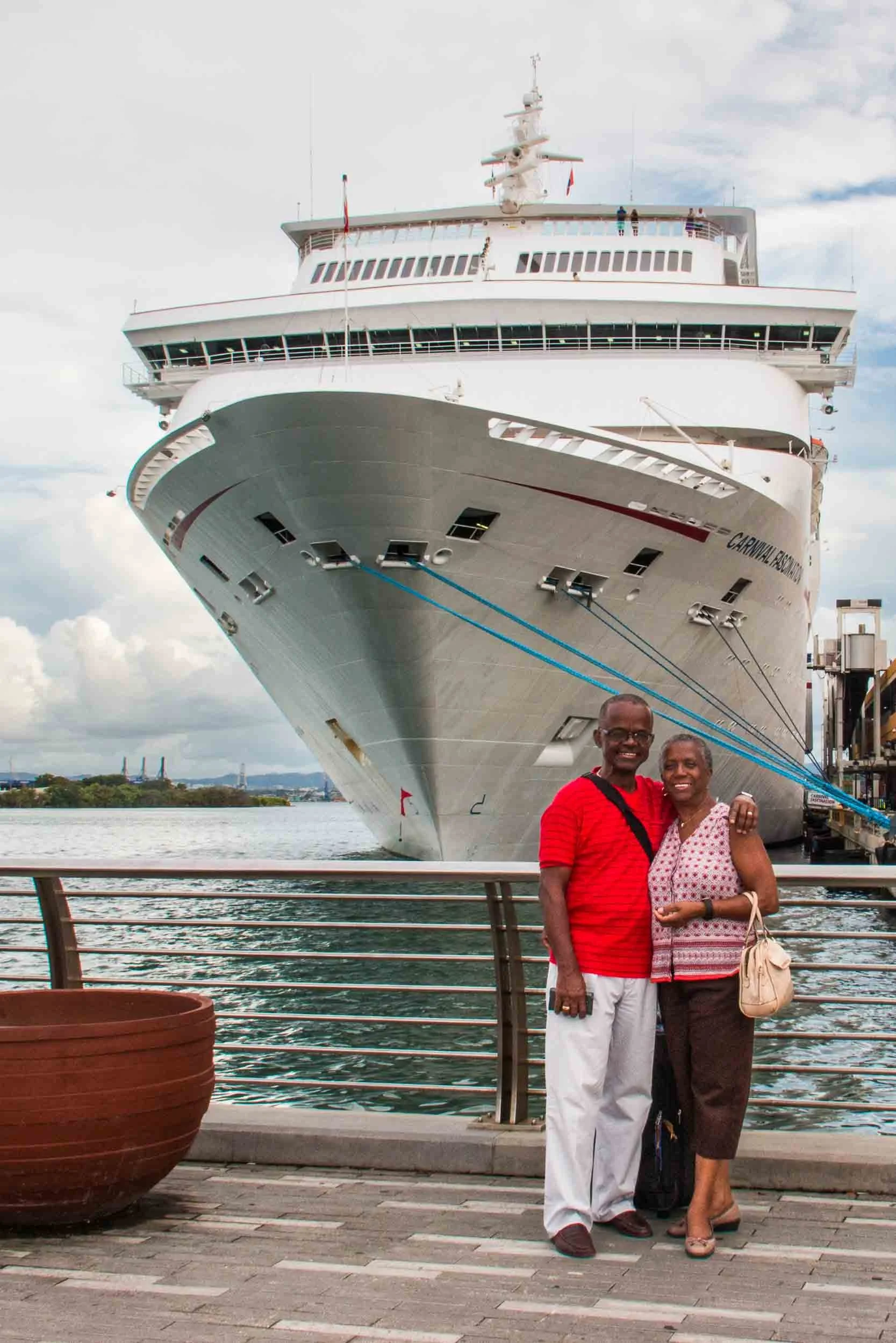 Posing for a photo with our ship the Carnival Fascination in the background.