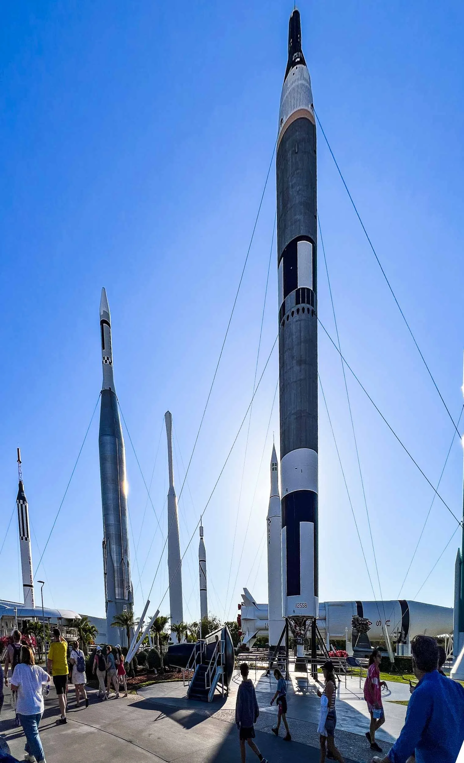 Foreground display is the Thor-Delta rocket; Left-center is the Atlas-Agena; Far left is mercury-Redstone; Background horizontal is the Saturn 1B