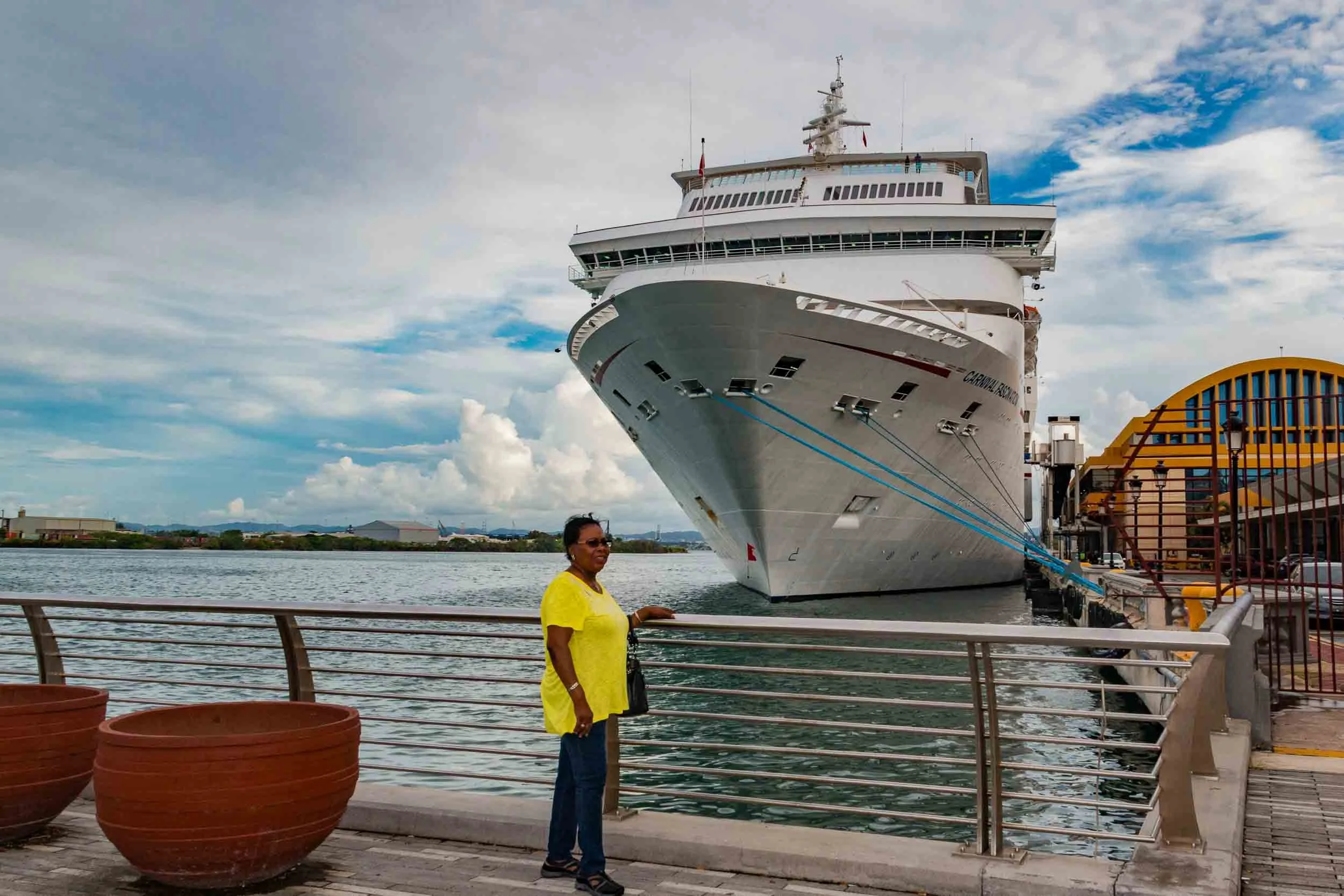 Posing for a photo with our ship the Carnival Fascination in the background.