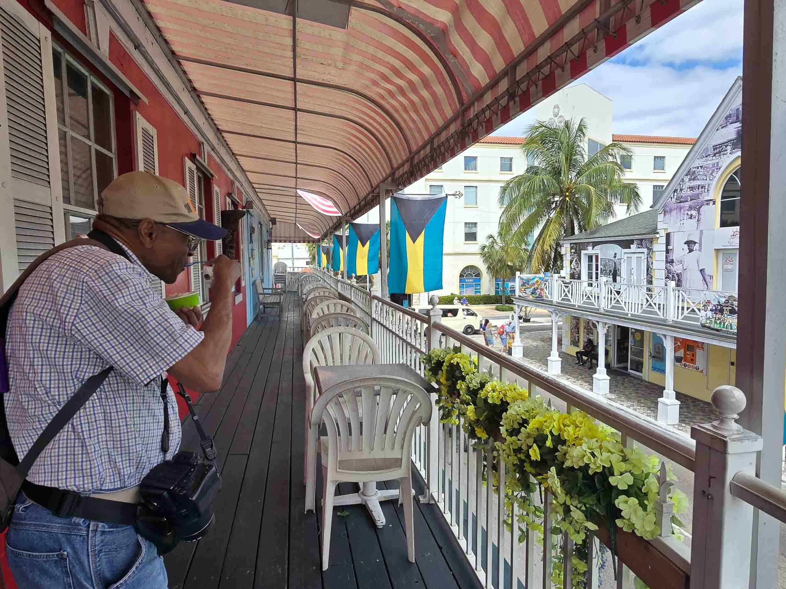 Enjoying ice cream while looking at Pompey Square from the 2nd level of the Main Street ice Cream Parlor.