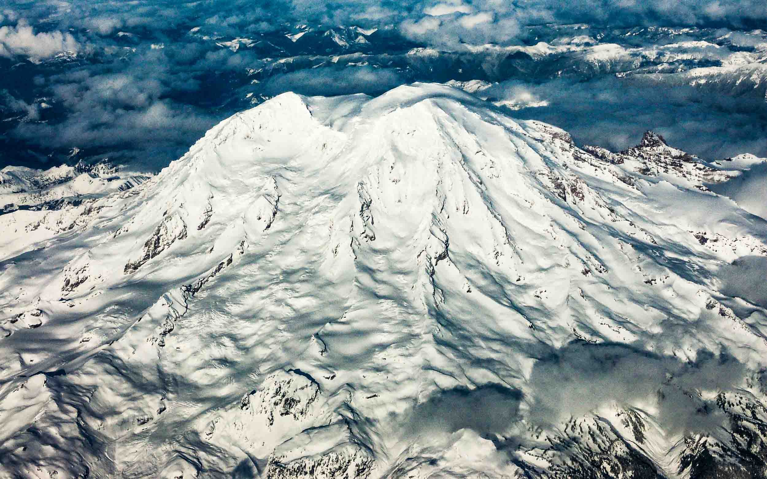 February 1, 2004: Mount Rainier while at a window seat on a commercial airliner, traveling from John Wayne airport to Boise, Idaho.