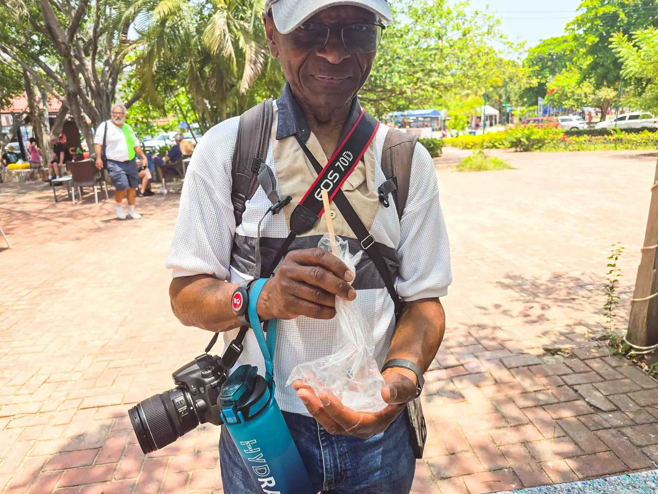 Coconut water in a plastic bag in Huatulco; a most unusual way to buy coconut water from a street vendor.