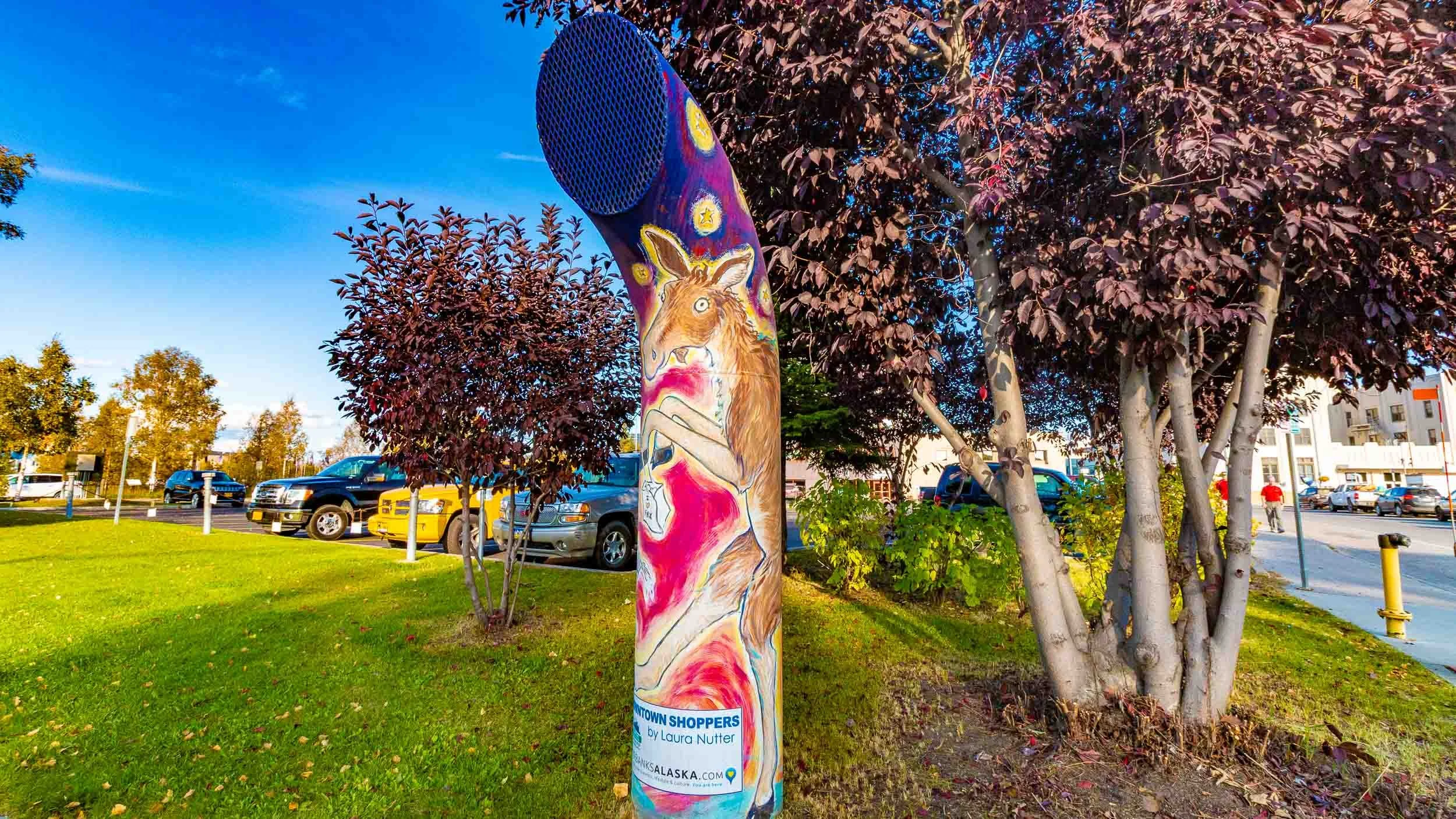 Decorative steam vents that are needed for the functioning of the underground hot water system. Artists paint them to beautify the area.
