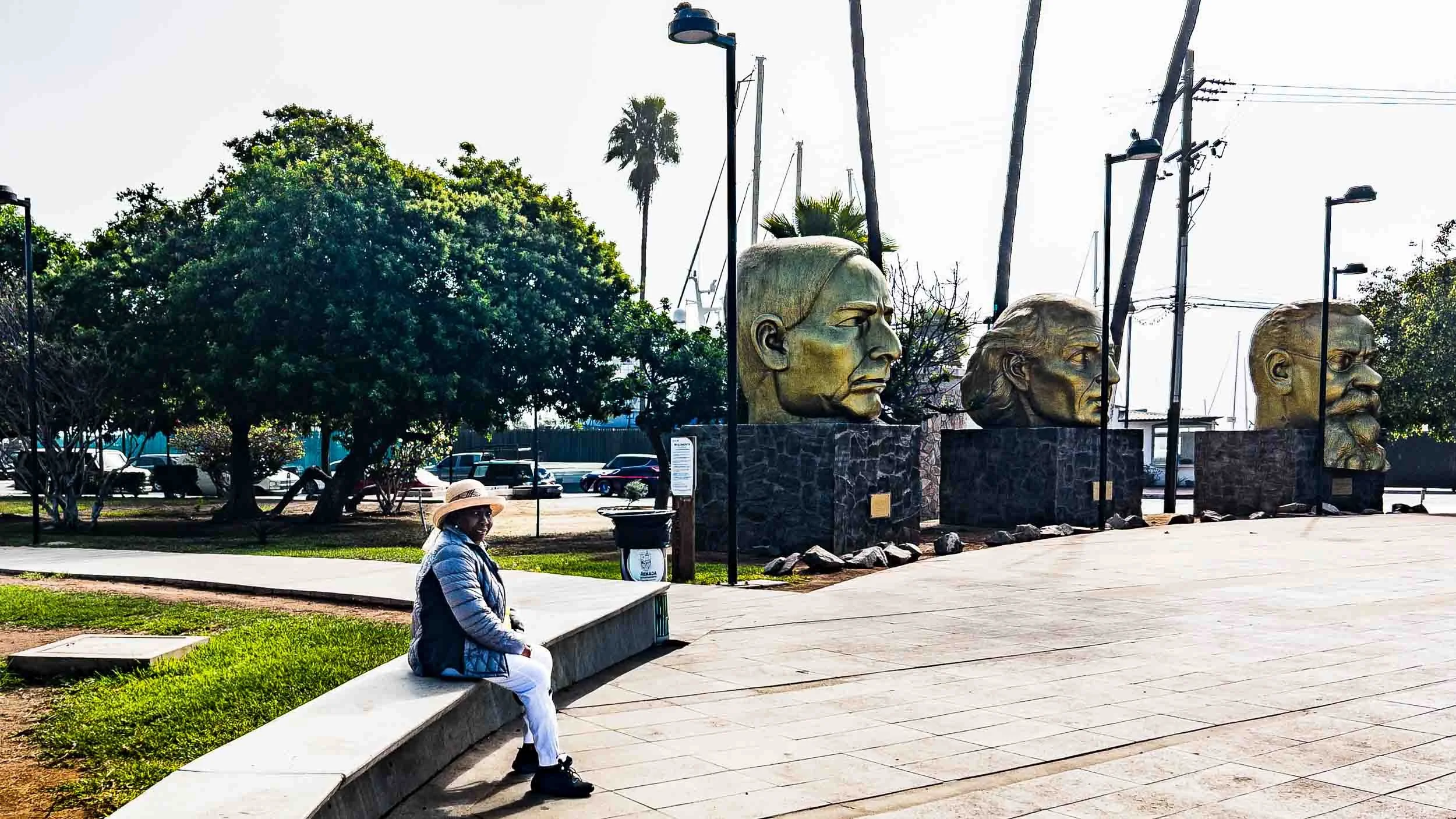 Relaxing in "Three Heads" Plaza.