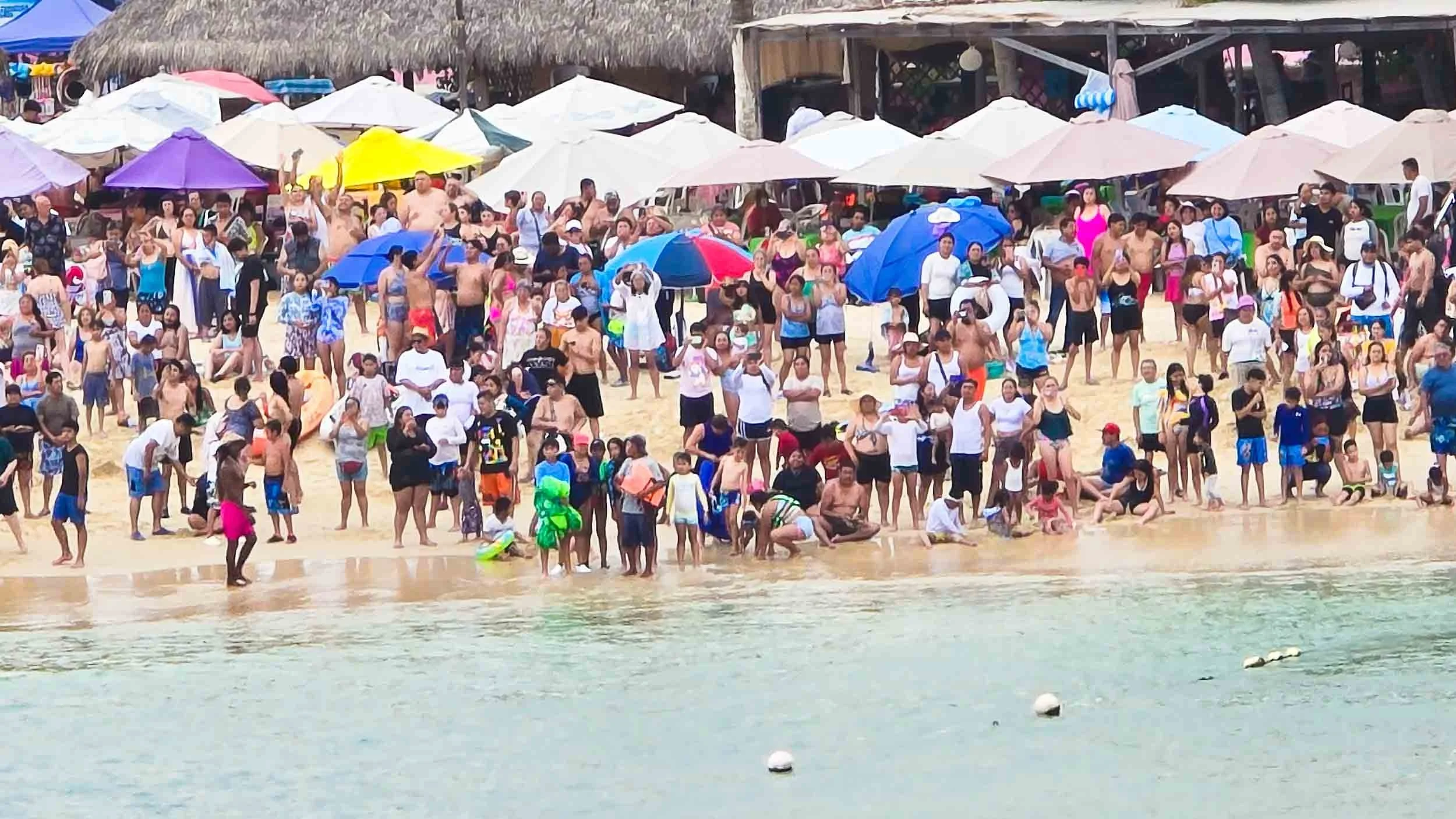 Local beach goers paused to watch our ship leave the docks and sail away!