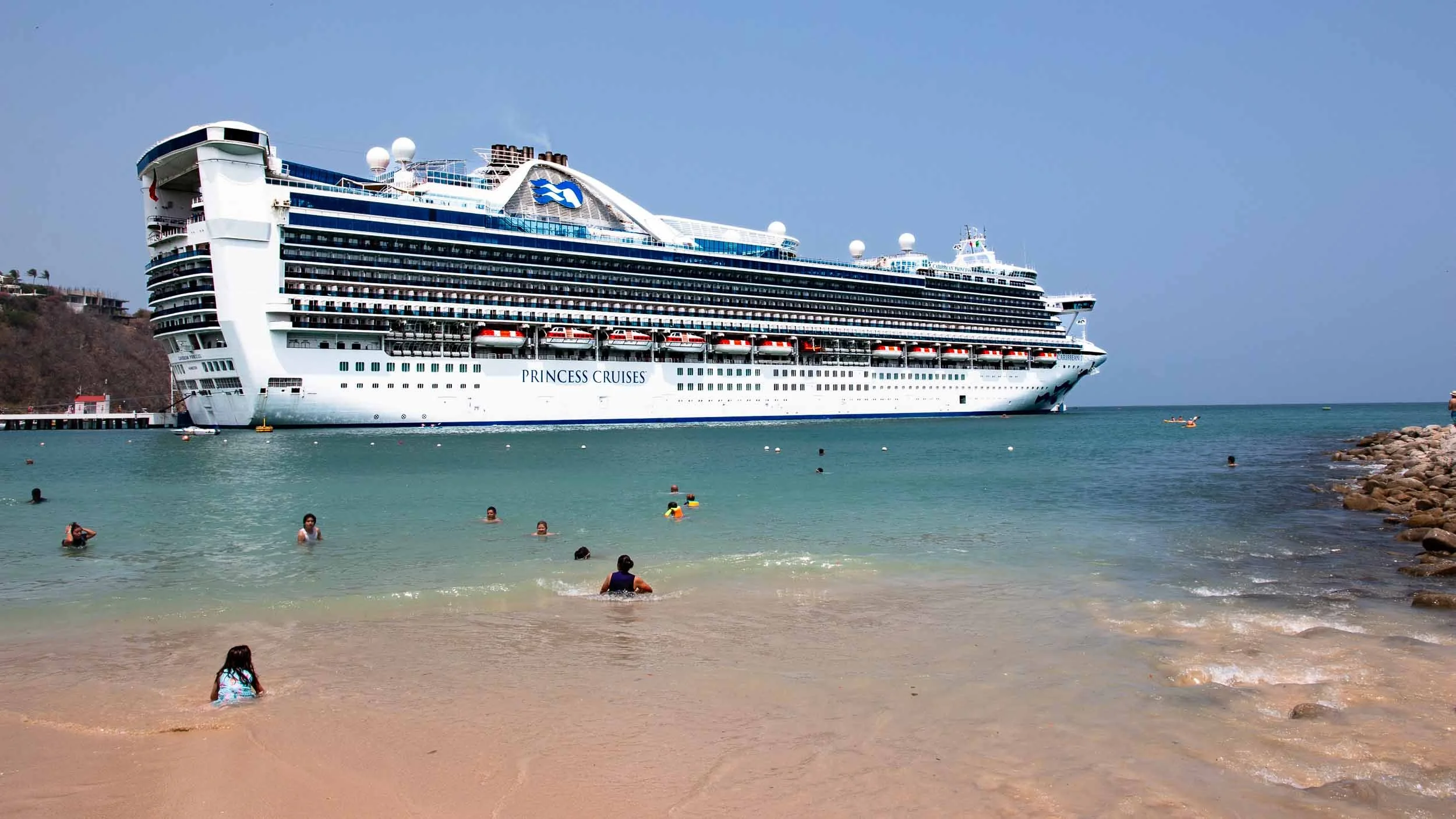 April 25, 2025: Swimmers in the same waters as the Caribbean Princess.  Not a usual site. Huatulco, Mexico.
