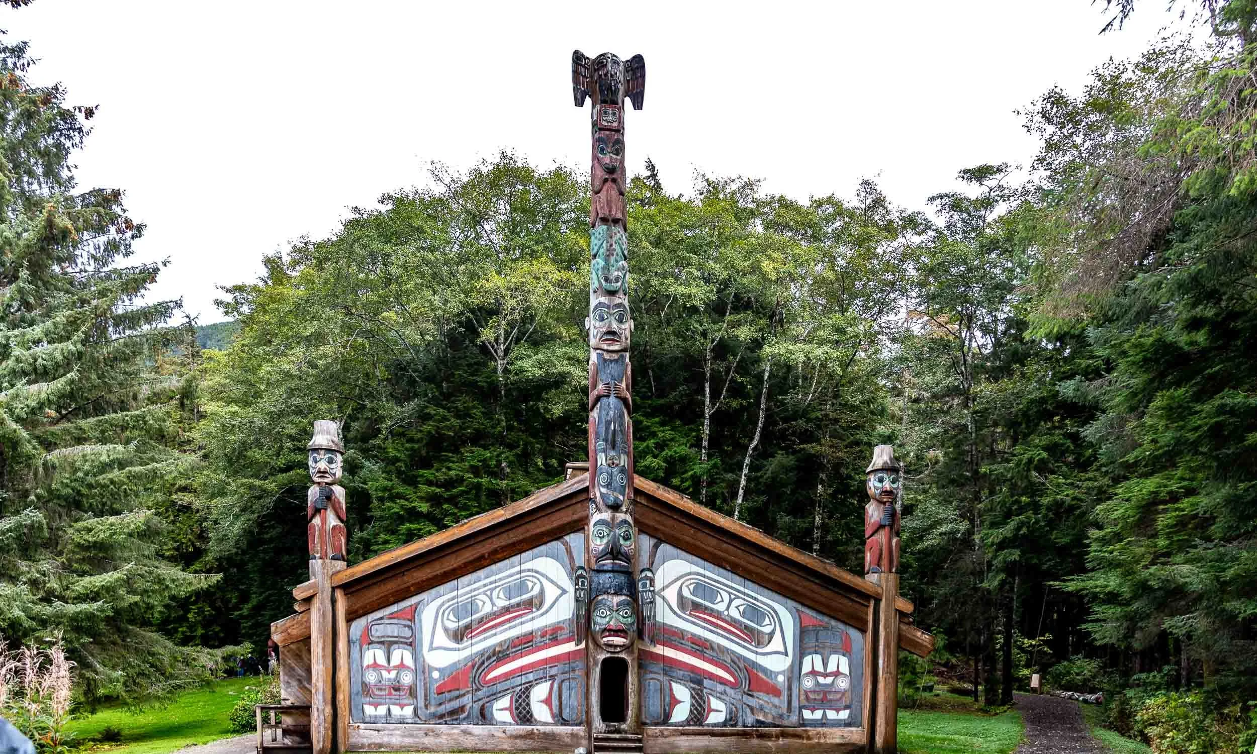 Totem Bight State Historical  Park in Ketchikan Alaska. The house is the clan house of the Tlingit and Haida Native Alaskan people.