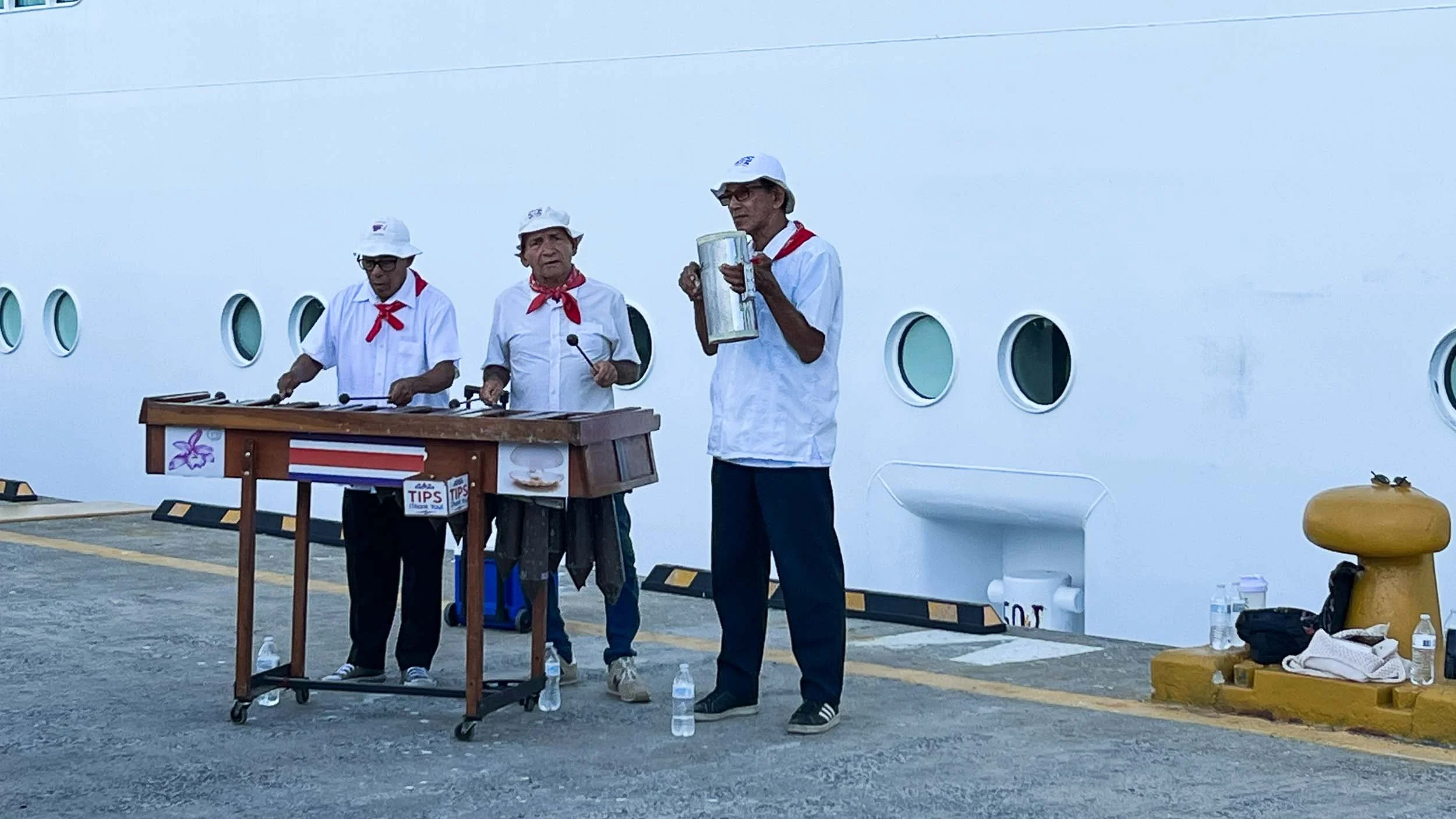 The locals welcome the ship's passengers. #2