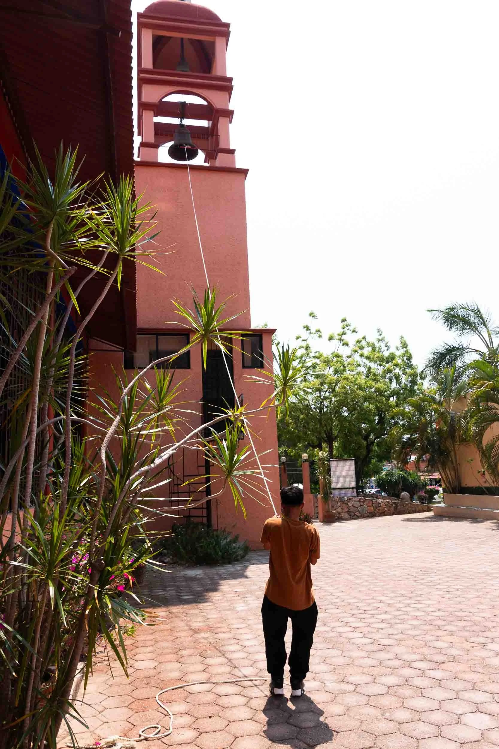 Time to ring the bell at the Church of La Crucecita, Hautulco, Mexico.