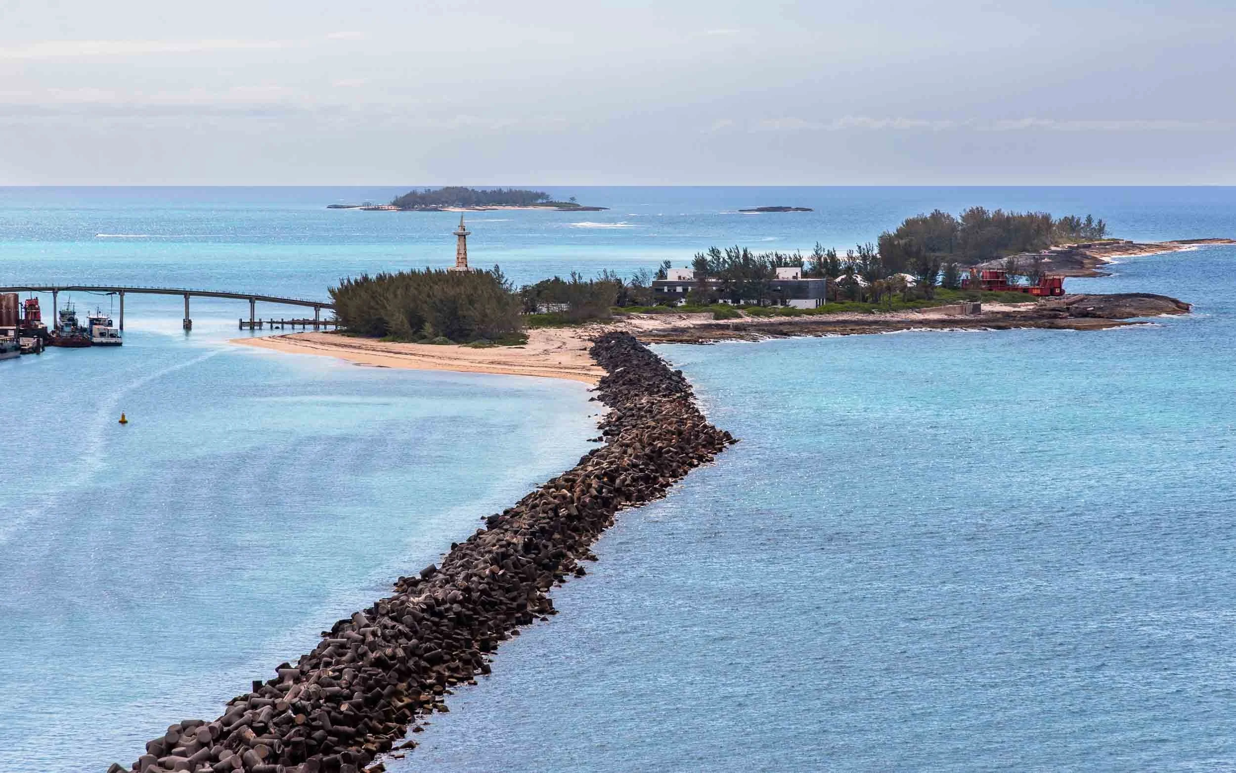 Breakwater in Nassau Harbor, stretching to Crystal Cay. The bridge to the left connects Crystal Cay to Arawak Cay. The nearest land mass straight ahead is Long Cay.