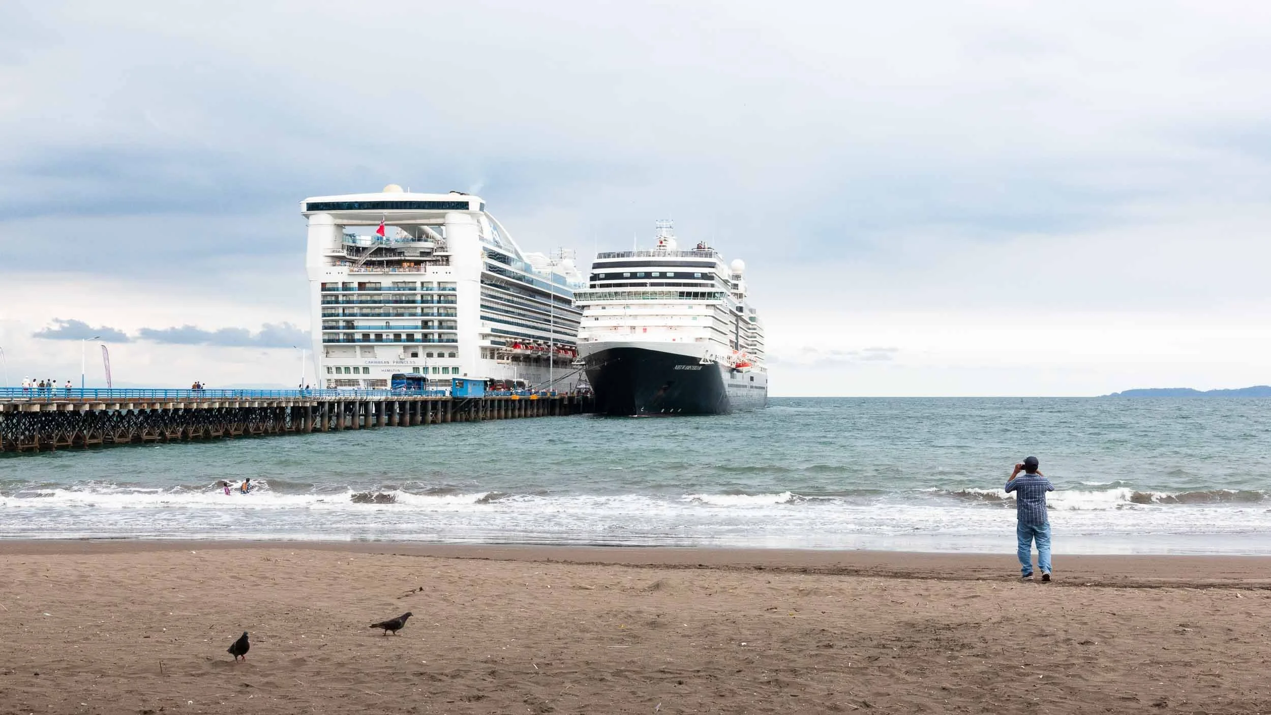 Two cruise ships in the harbor.