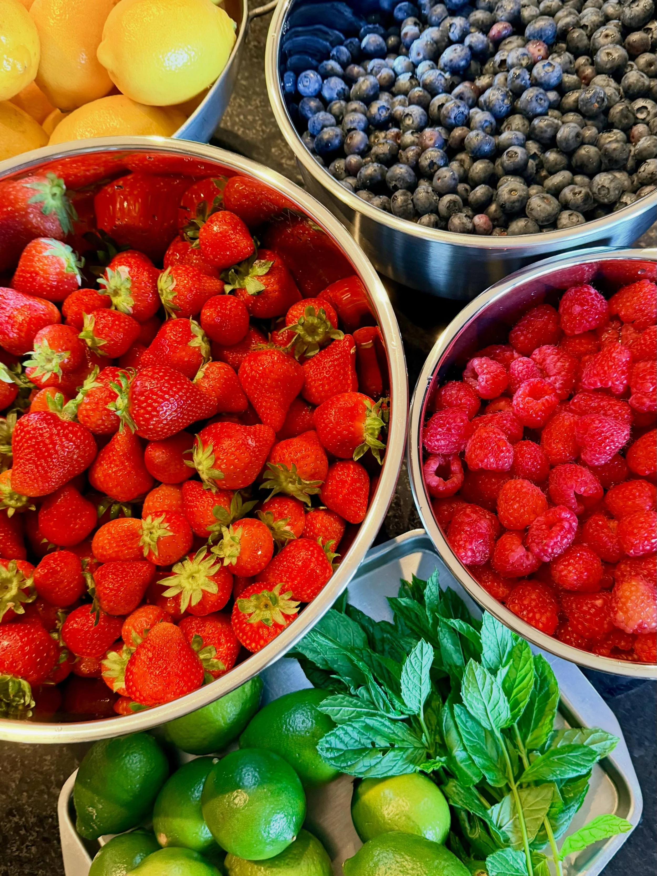 Before &rarr; After 🍓🍋✨

What goes into serving 160 guests?

6kg+ of berries, 30 lemons and limes, bottles of honey and agave, and HOURS spent chopping, simmering, blending and bottling