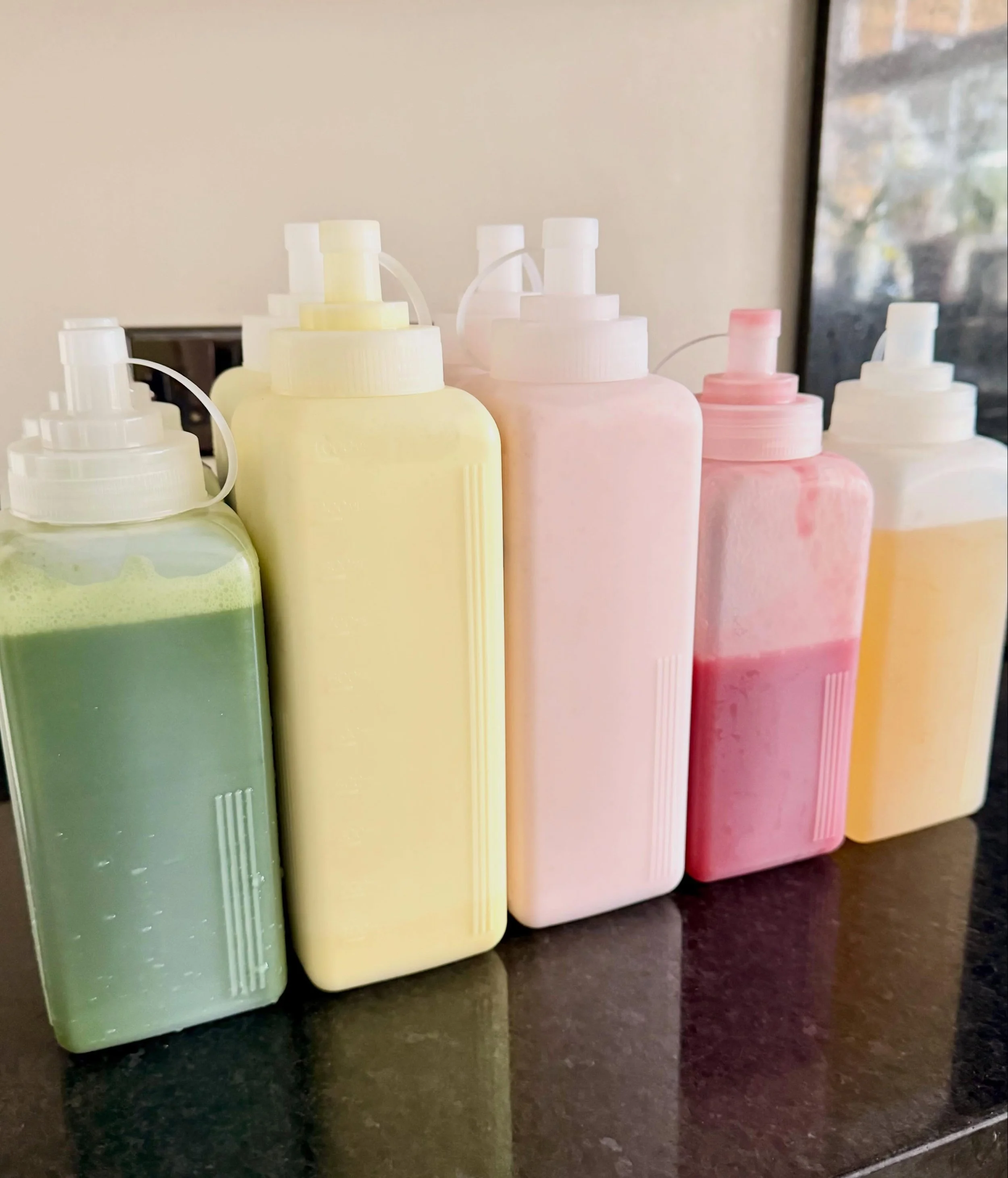 A lot of work goes into our drinks before the event begins. 

Every bottle you see has been made in-house, from our fruit syrups and signature sauces to our fluffy cold foams. Making everything from scratch takes more time, but the flavour speaks for