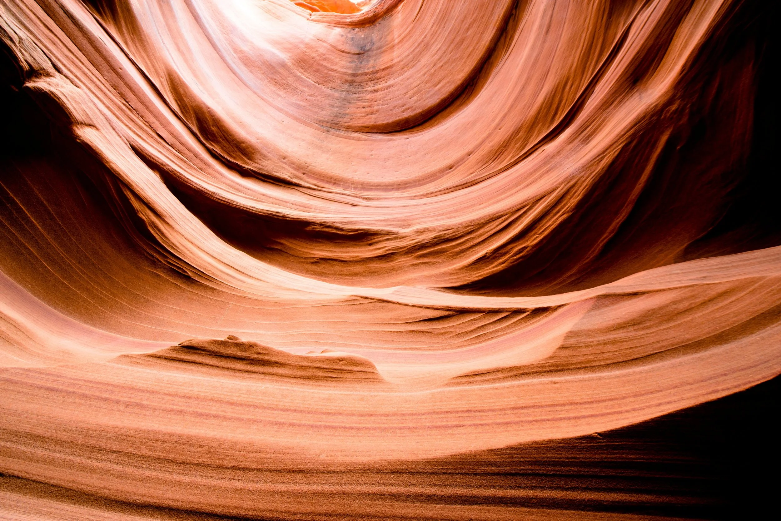 flowing canyon curves representing continuity, reflection and ongoing conversation