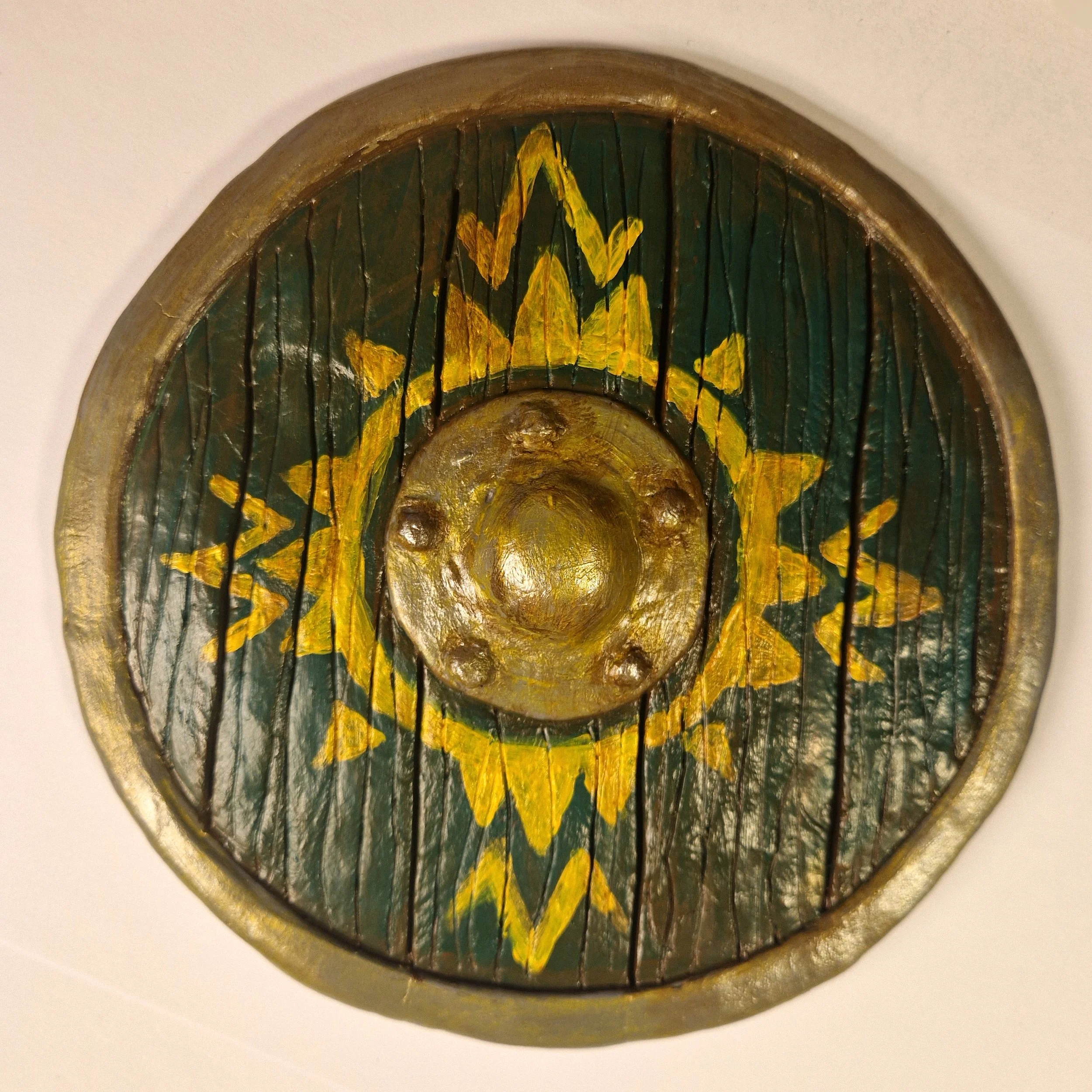 painted clay shield