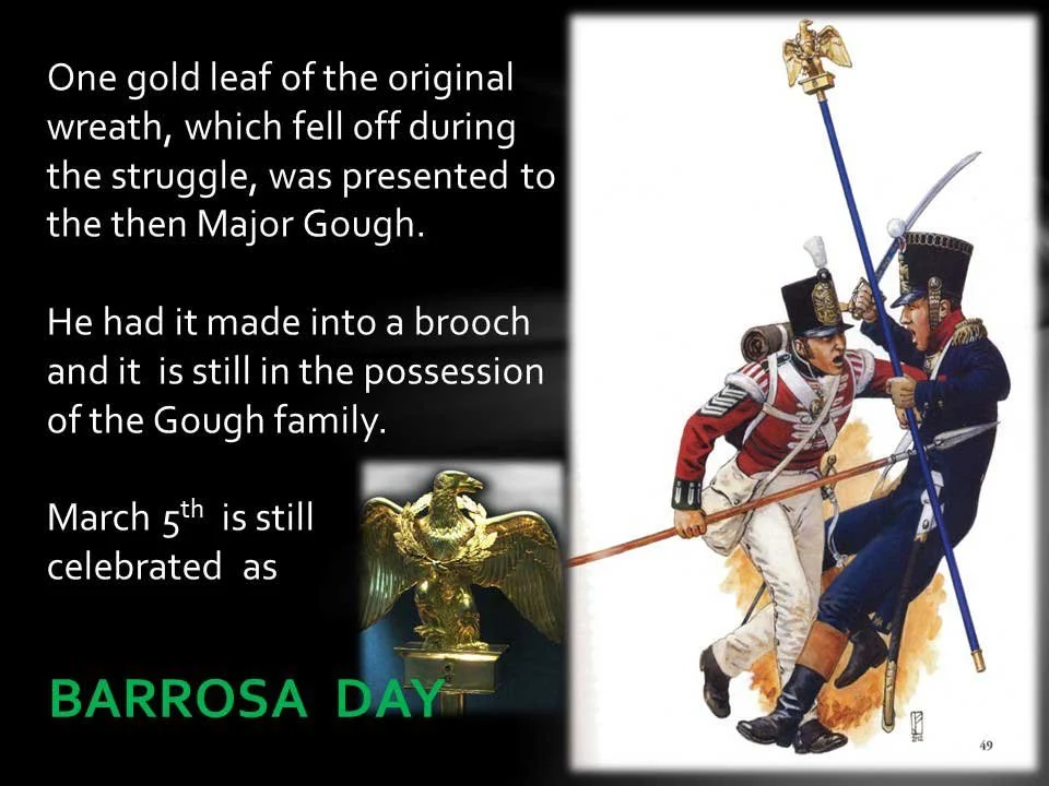 Illustration of two soldiers in historical military uniforms combatting with bayonets and swords. One wears a red coat and the other a navy blue coat. There is also a gold eagle statue. Text explains the history of a gold leaf from an original wreath and its significance to Barrosa Day celebrated on March 5th.