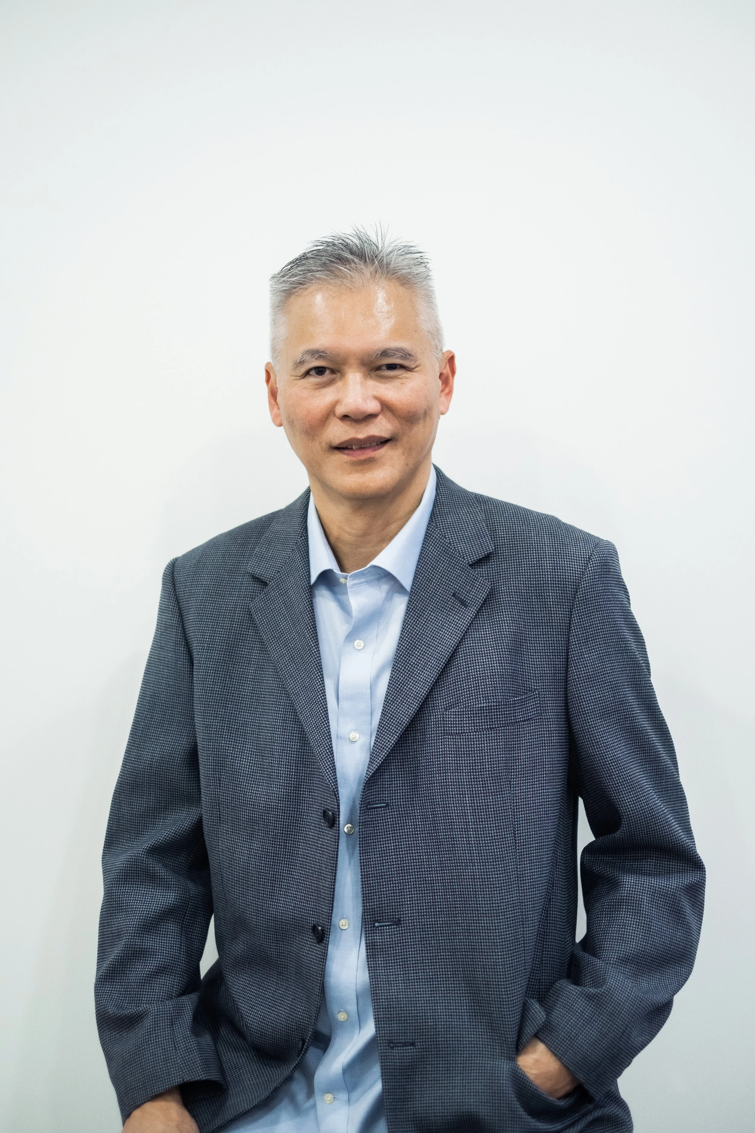 image of pasture group ceo in a grey jacket and light blue shirt