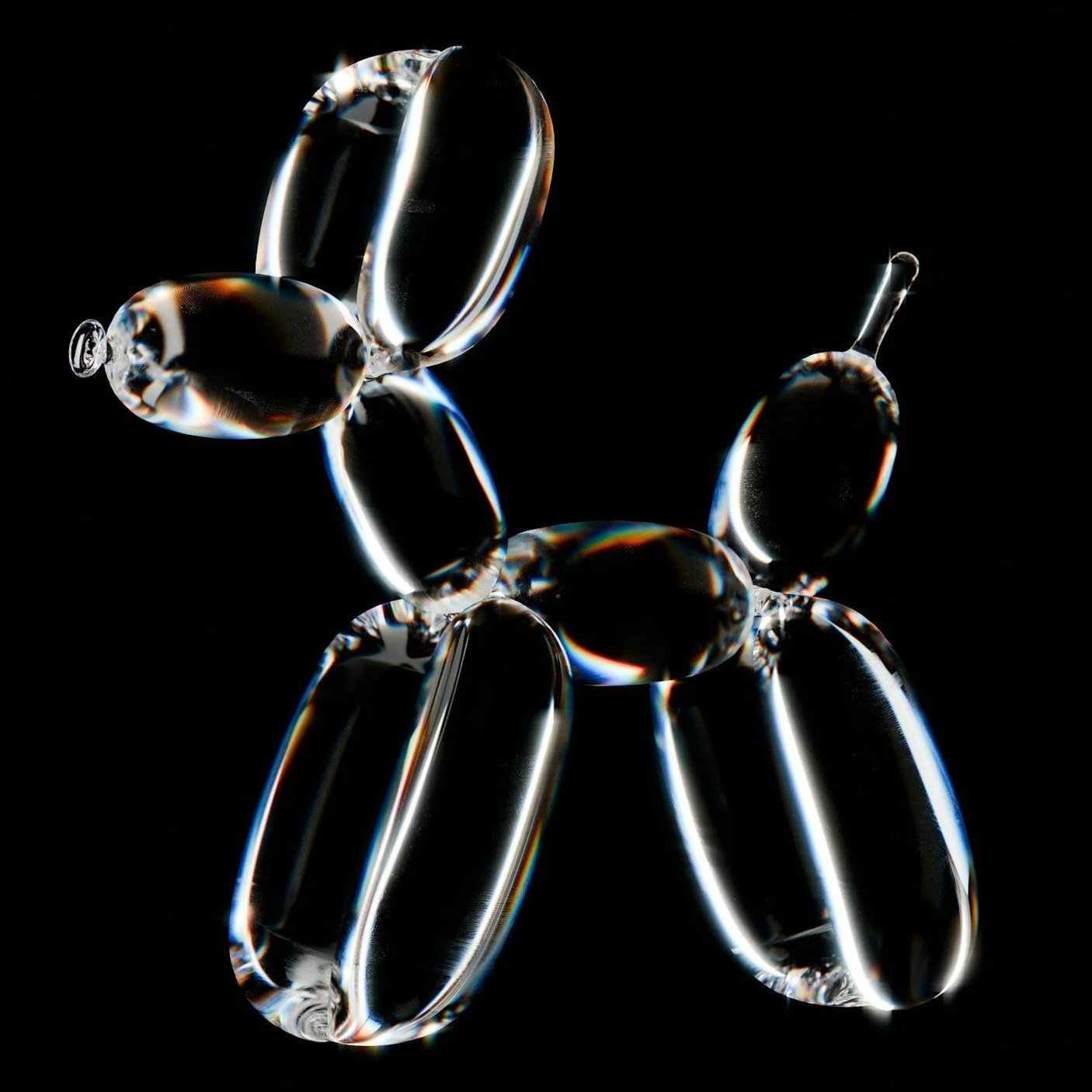 Close-up of a delicate glass butterfly sculpture against a black background.