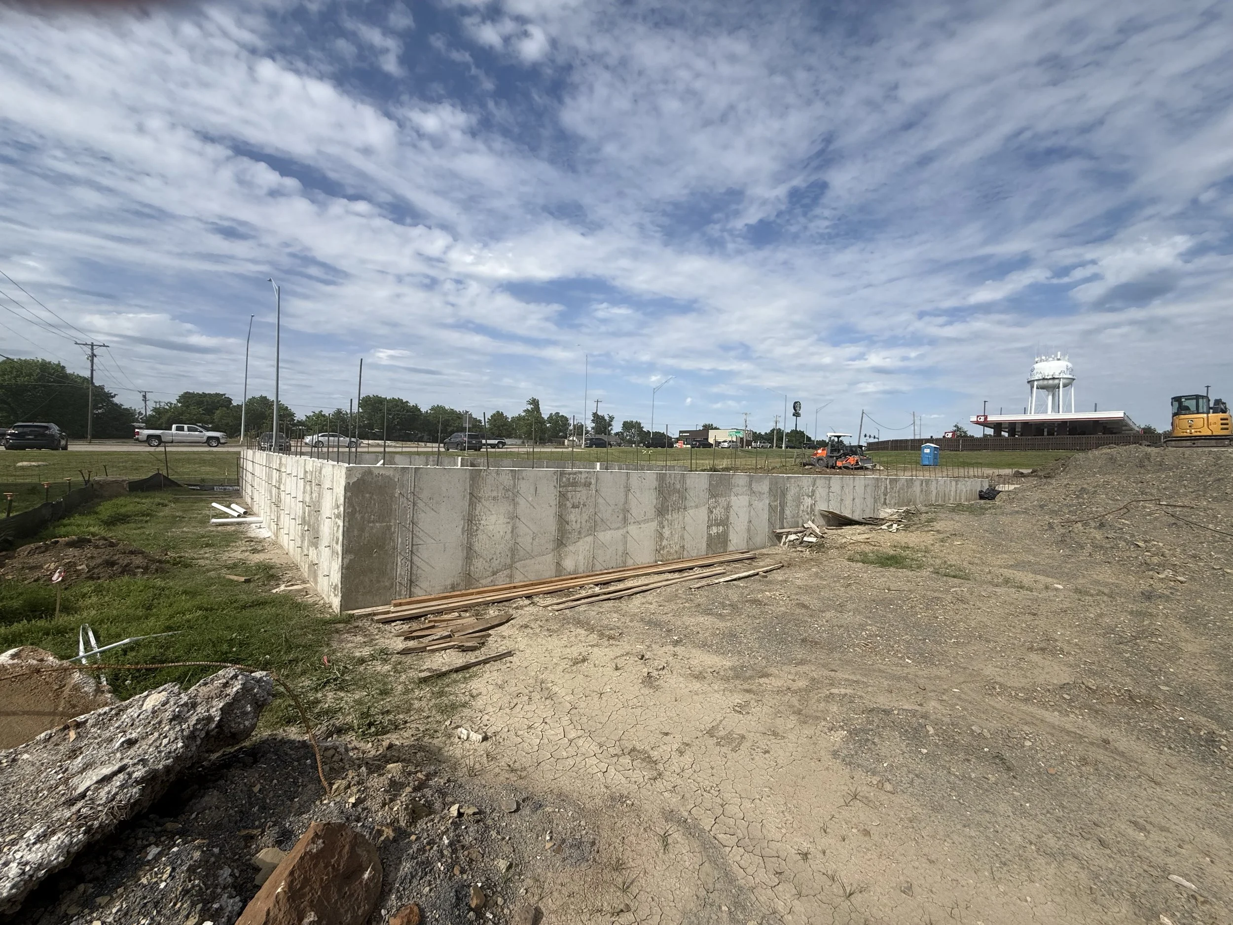 Completed perimeter concrete foundation walls for industrial flex warehouse development near Tulsa at Hwy 97 and I-44 in Sapulpa Oklahoma