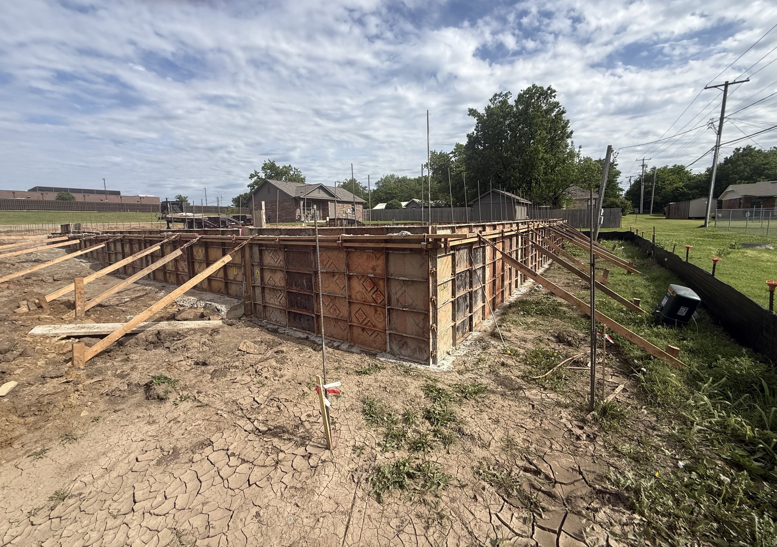 Concrete foundation wall forms installed for industrial flex warehouse development near Tulsa at Hwy 97 and I-44 in Sapulpa Oklahoma