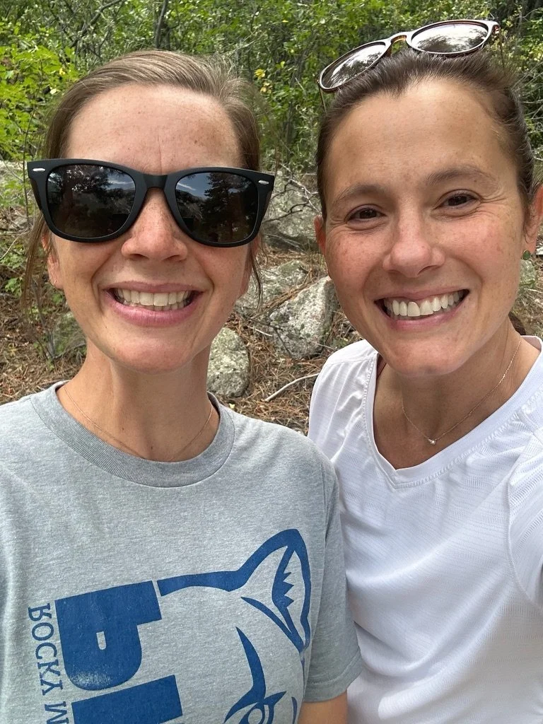 Andrea and April outdoors smiling at the camera