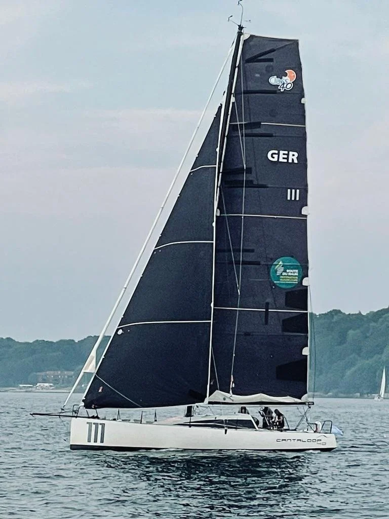 Class 40 Cantaloop 40  111 on its side, co skipper David Rowen, sailing on a Baltic Sea.