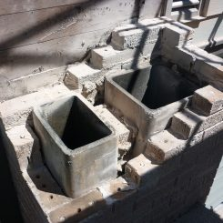 Concrete blocks and bricks stacked on a construction site