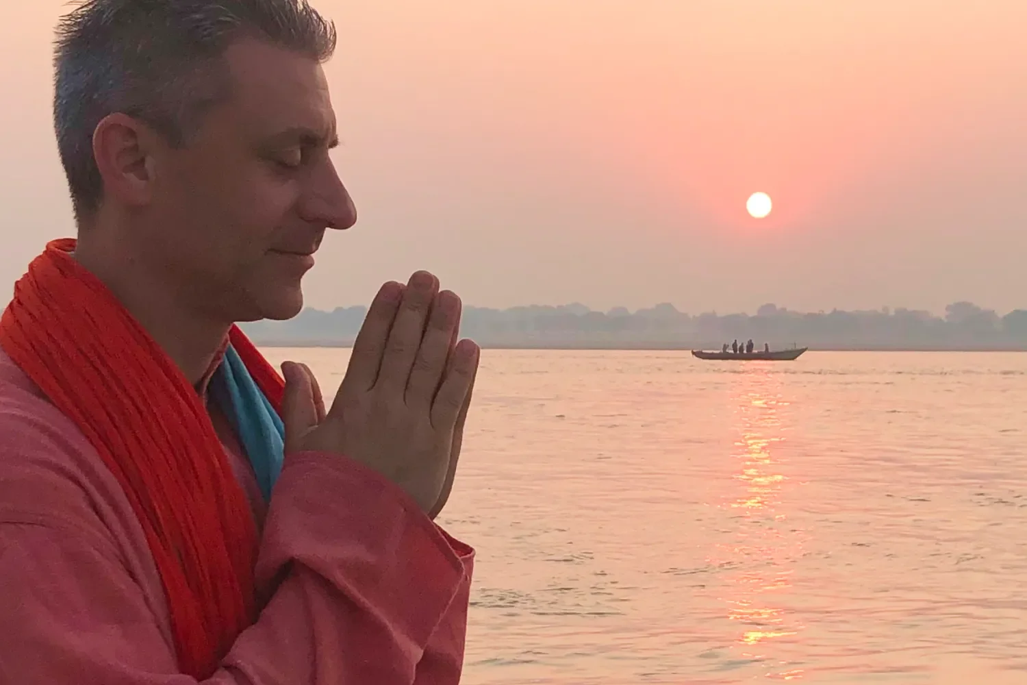 Yoga instructor, Luke Ketterhagen sunset on lake