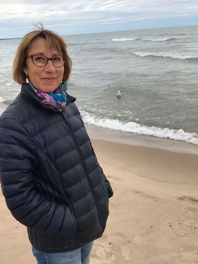 Yoga instructor, Veronique Jewell at the lake on a breezy day