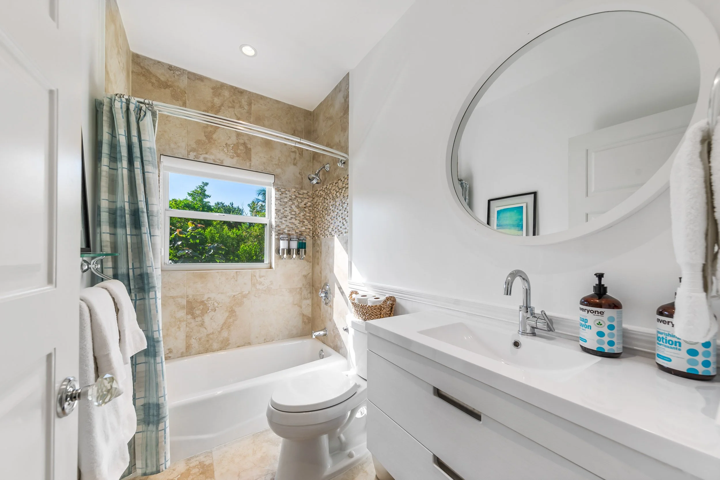 Shared Bathroom with Tub/Shower Combo