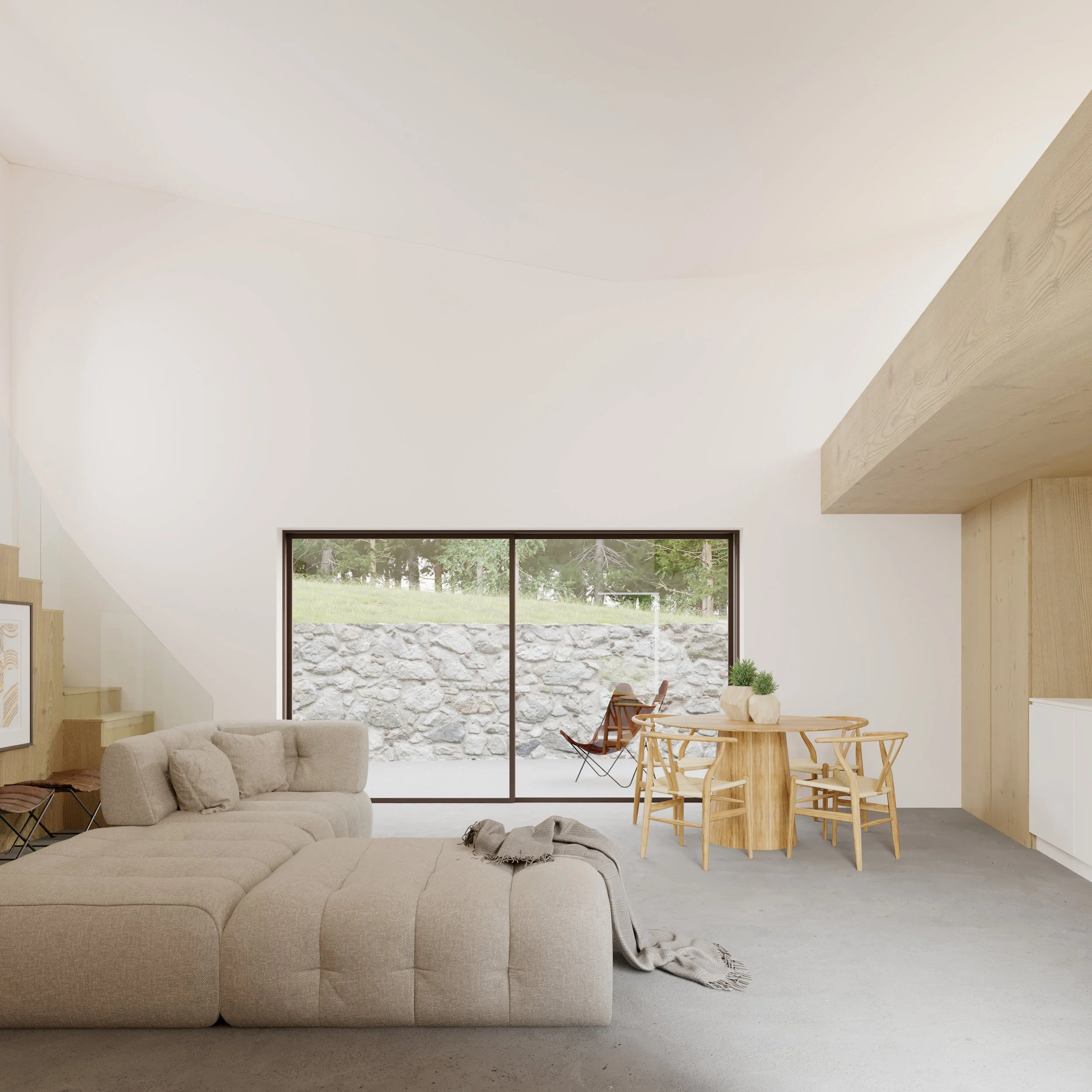 Living room with beige sectional sofa, round wooden dining table with chairs, large sliding glass door leading outside to a stone patio with outdoor chairs, and a staircase on the left side.