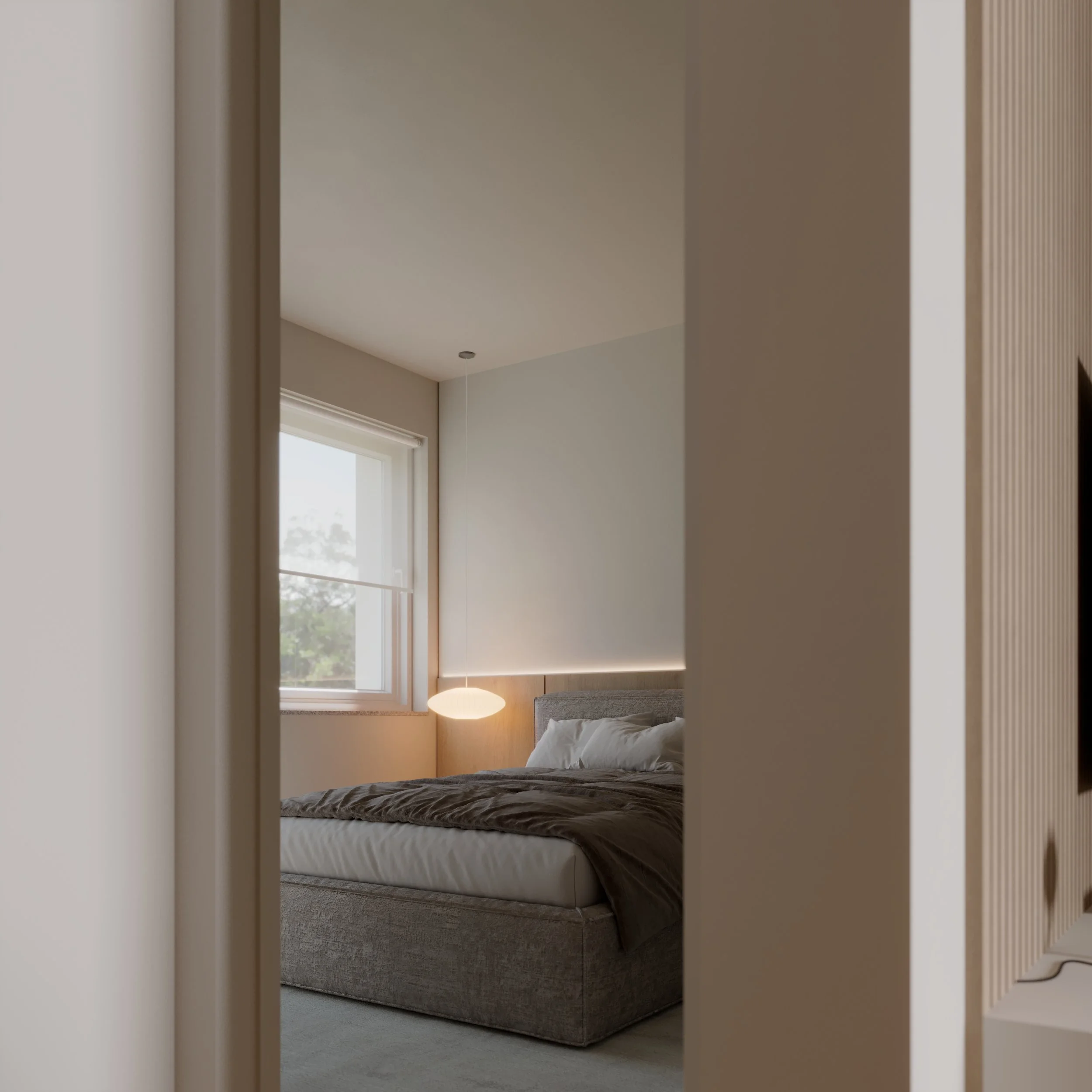 A modern bedroom with a window, a bed with a headboard, pillows, a blanket, and a bedside lamp.