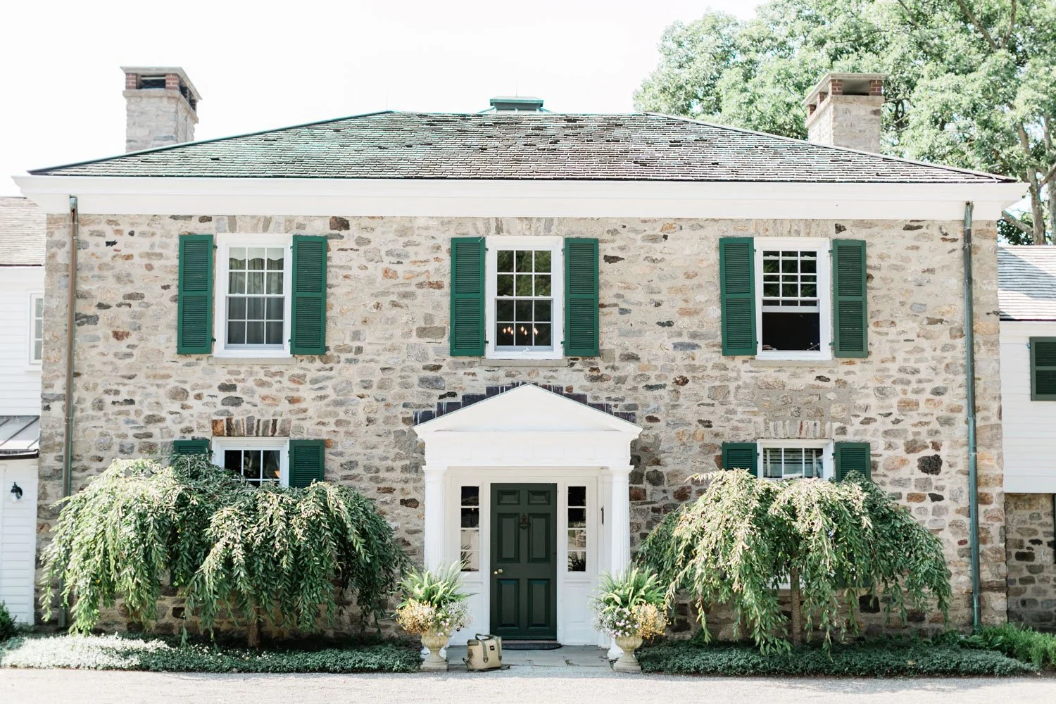 Perkins House | The Perkins House is a 1920s fieldstone house that can accommodate 22 guests with 10 guest rooms. The first floor of the Perkins House can be used as event space. You can wander the halls to find a dining room, living room, library an
