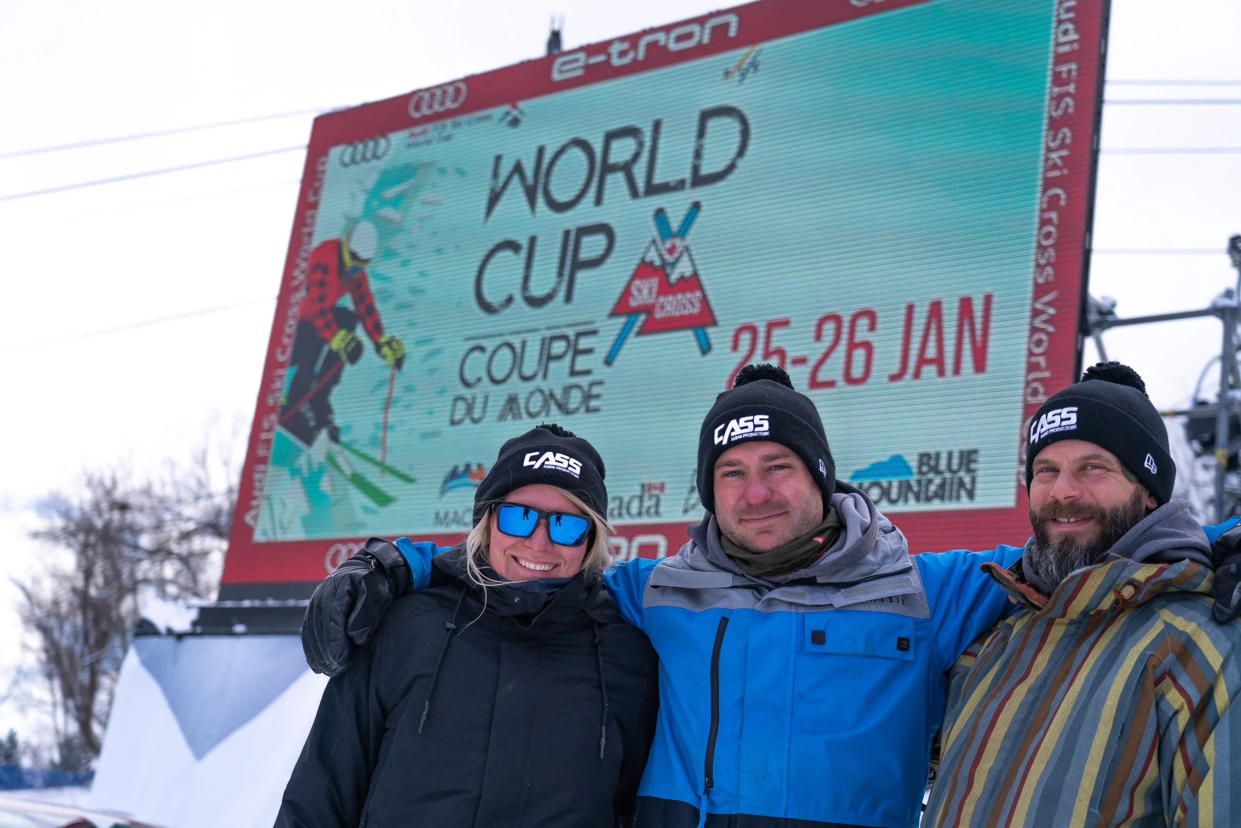 Cass Audio Crew - Sarah, Ben & Skip in front of World Cup Audio digital signage
