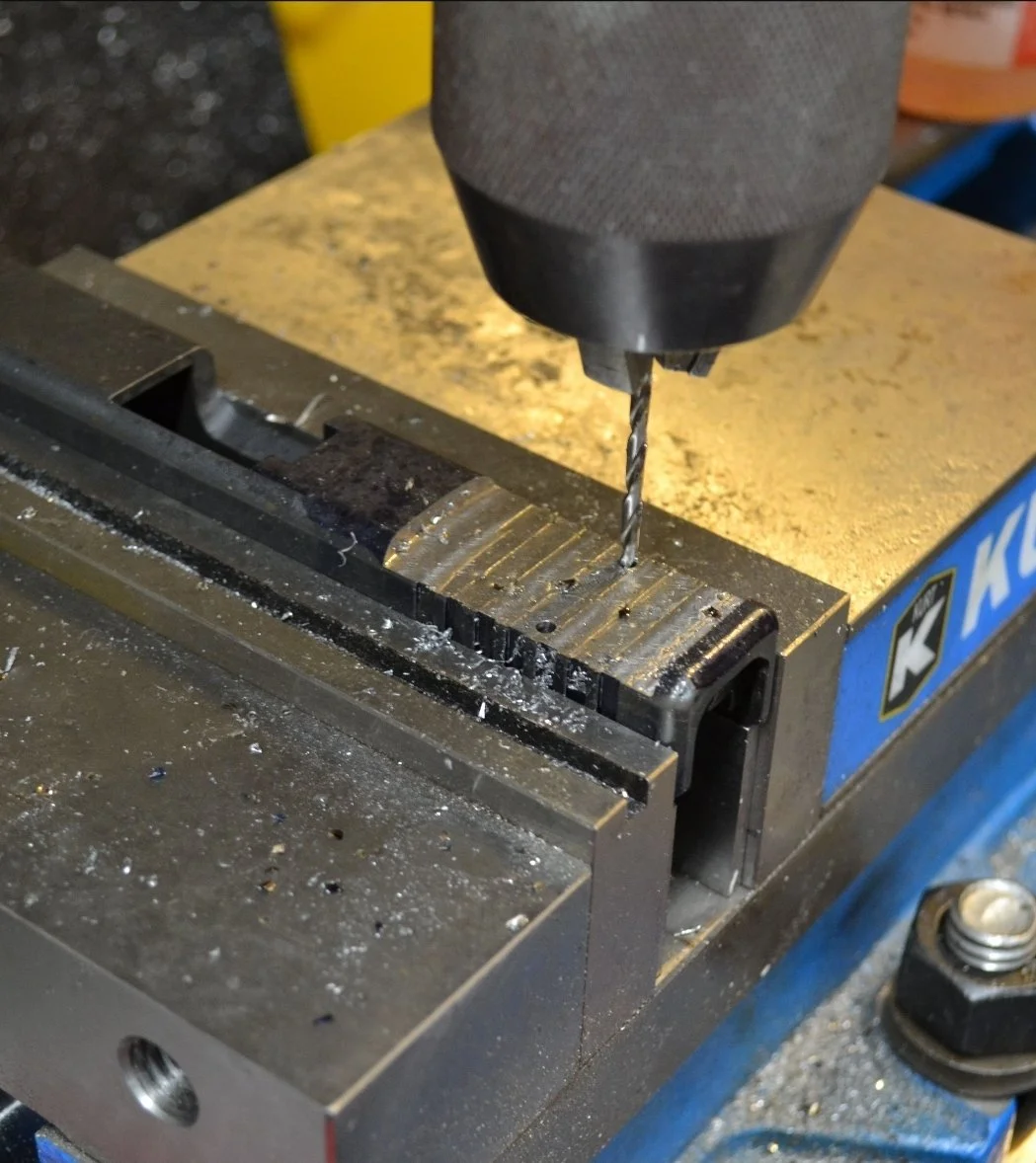 Precision milling drilling operation for RMR optic cut on pistol slide at Nexus Defense & Machine Co machining firearm components in Holland, PA
