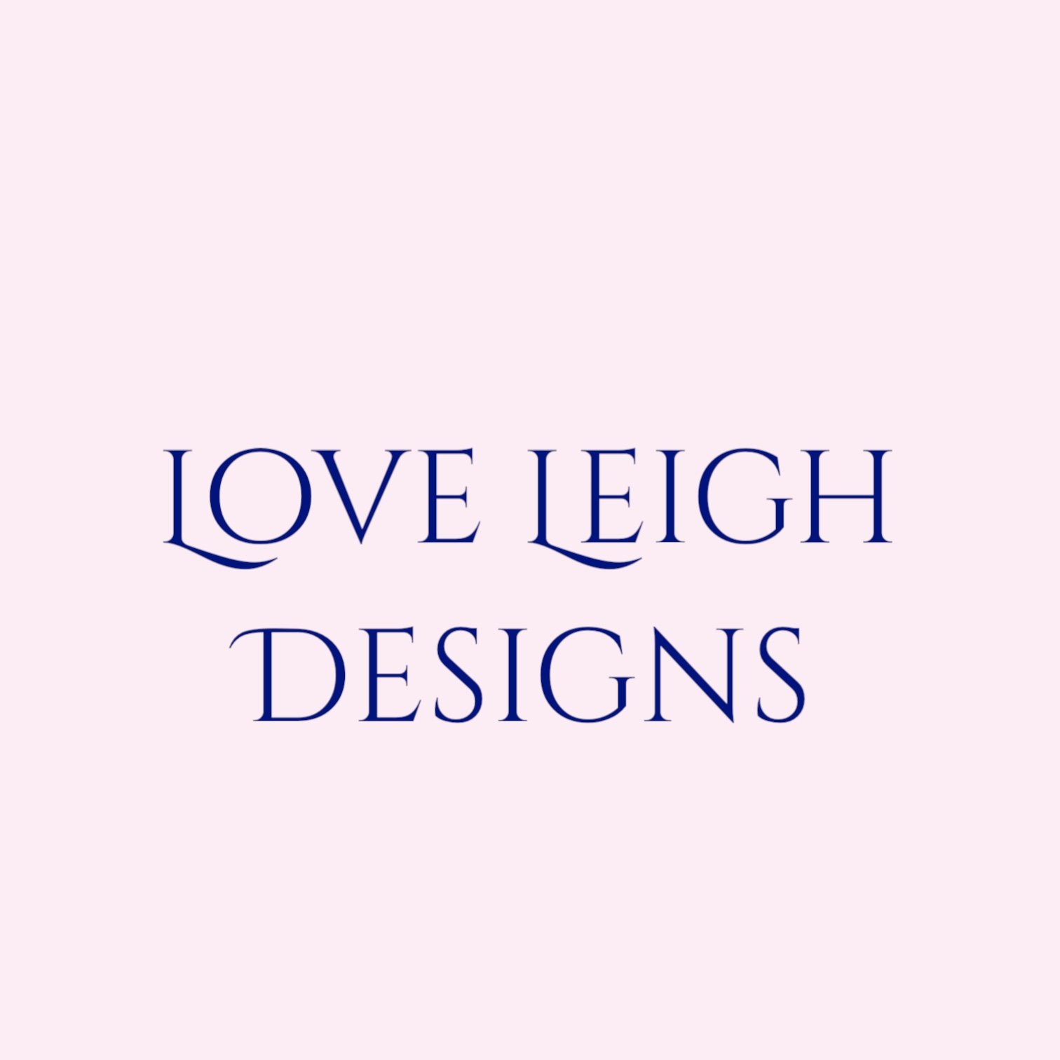 Pink background with dark blue text reading "Love Leigh Designs".