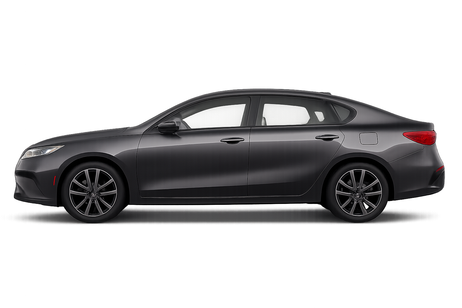 A black sedan car facing left, parked indoors with colorful abstract background.