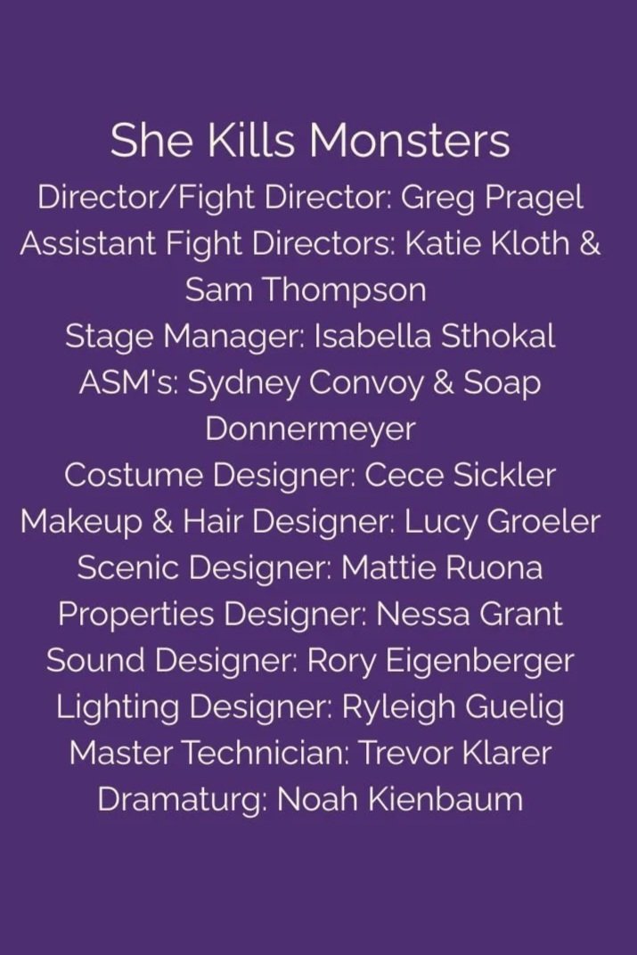 Title 'She Kills Monsters' with show credits listing director, fight directors, stage manager, ASMs, costume designer, makeup and hair designer, scenic designer, properties designer, sound designer, lighting designer, master technician, and dramaturg