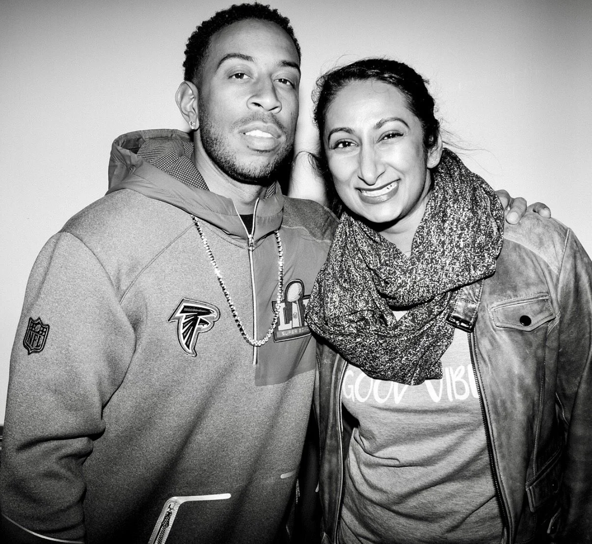 The Pearl Edge founder Parul "Pearl" Chokshi standing with Ludacris