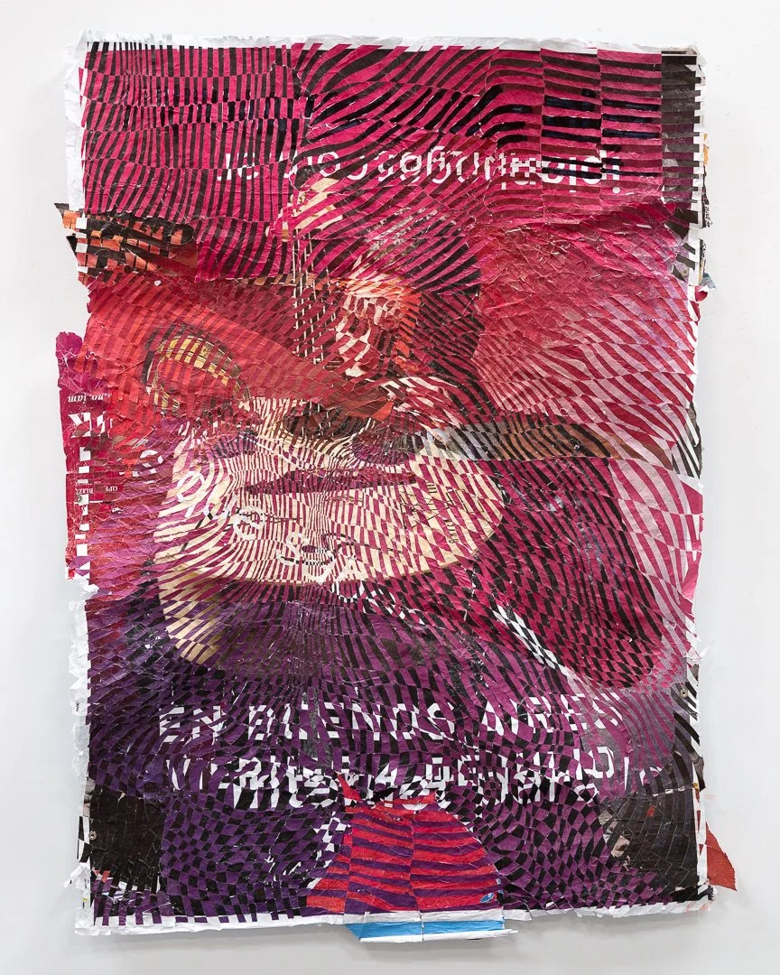 Artwork made from woven street-posters, featuring an abstracted portrait of a guitarist in shades of pink, red, purple, and black, creating a textured, distorted image.