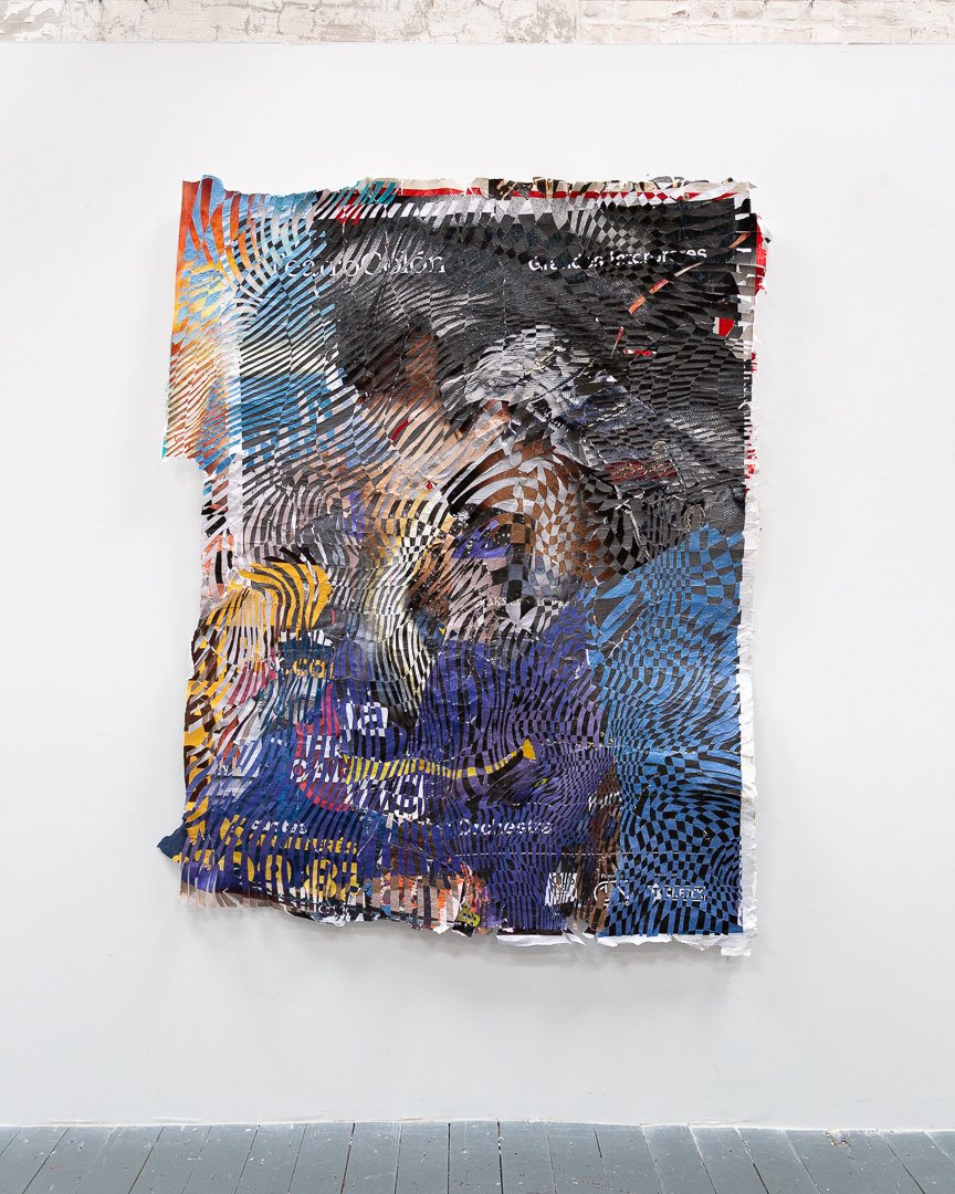 Woven street-posters comprise this wall art piece featuring geometric patterns and fragmented images overlaid on a colorful background, mounted on a white gallery wall.