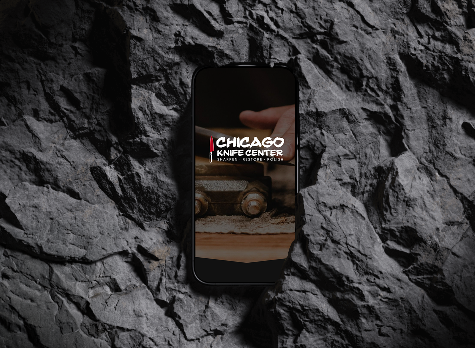 CKC_Mockup_Iphone 15 on rock.png
