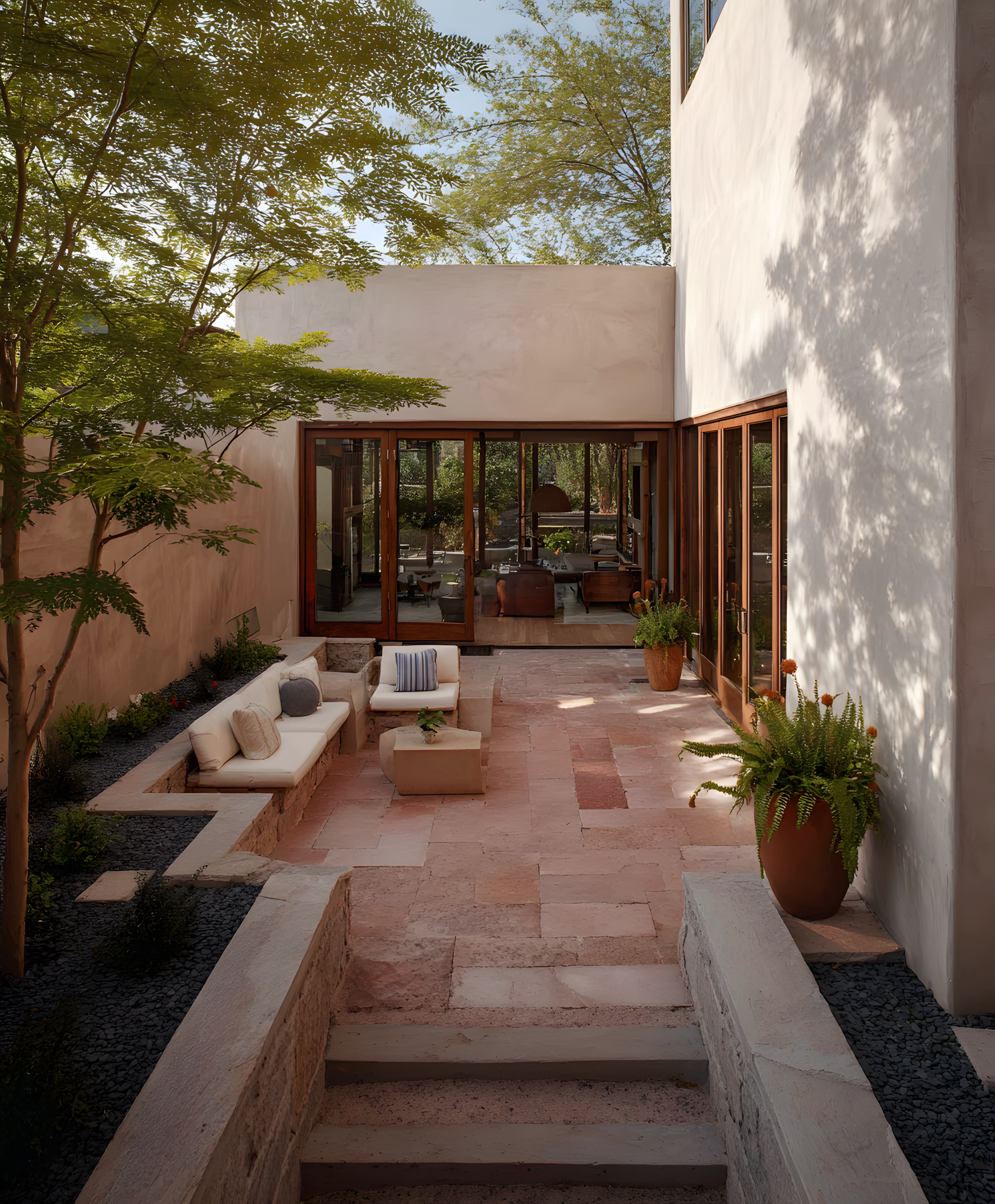 Contemporary courtyard residence with warm architectural materials and narrative-led property positioning design.