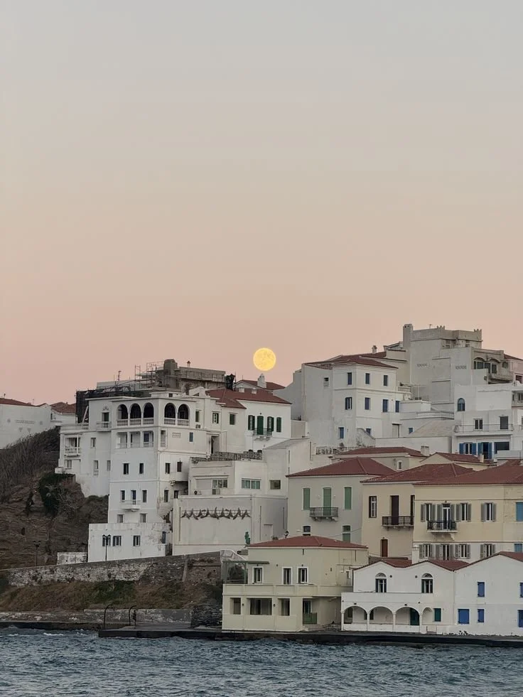 Evening light over island, in Greece, capturing the quiet atmosphere of Mediterranean coastal living.
